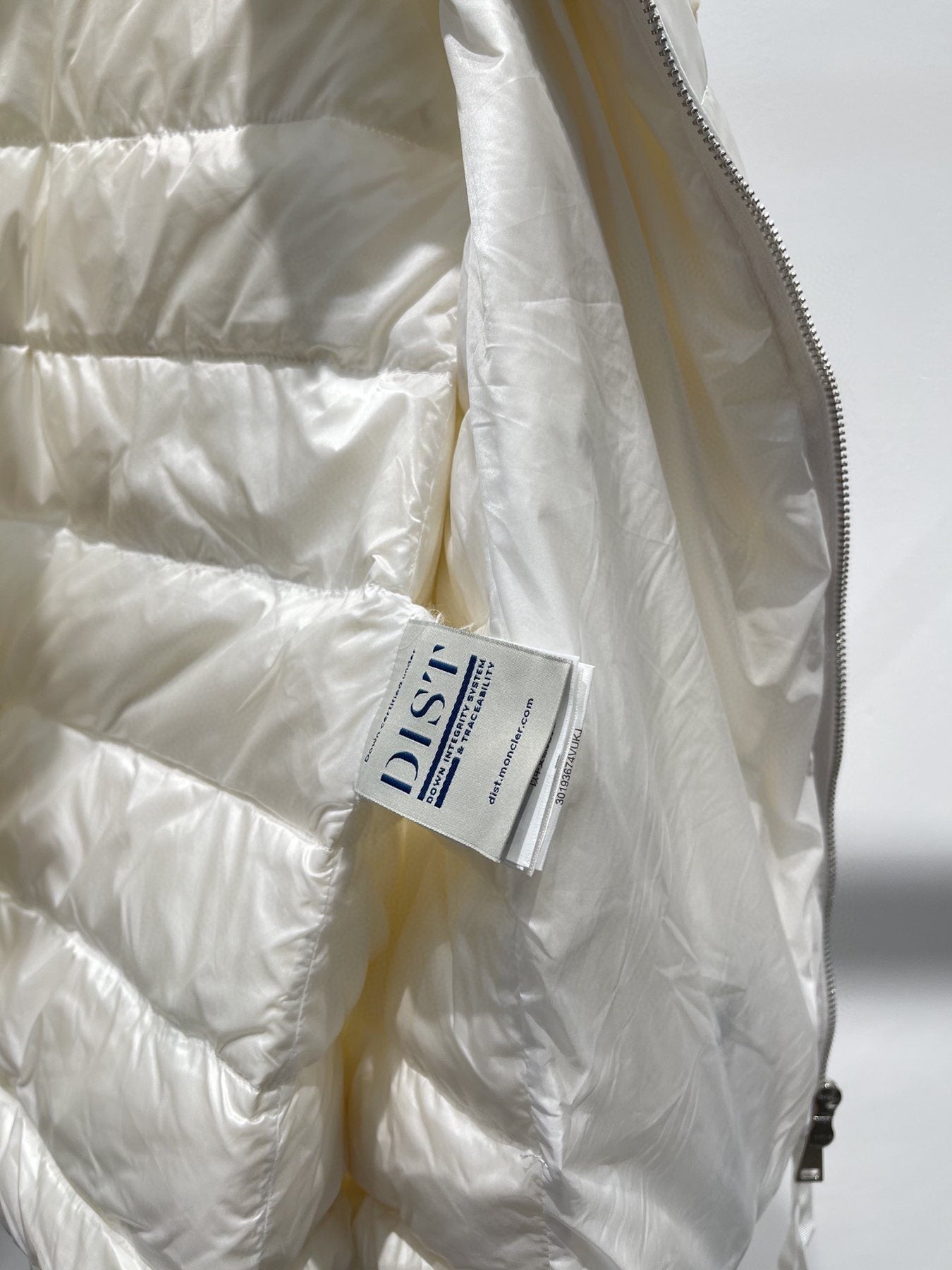 Moncler Quilted Knit-Sleeve Down Jacket — hang_tag