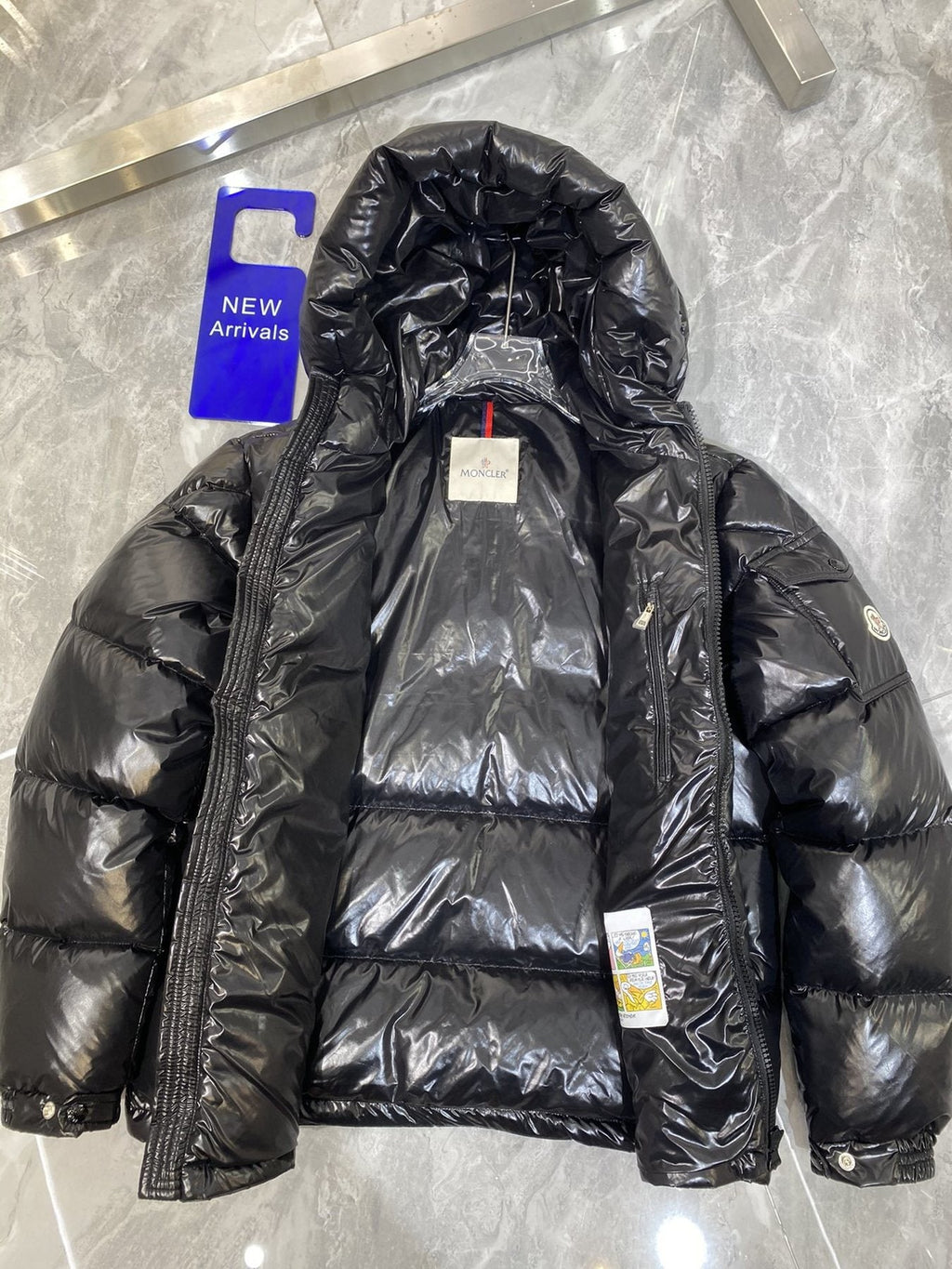 Moncler Hooded Quilted Puffer Coat — hang_tag