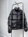 Prada Black Convertible Puffer Jacket with Red Chest Stripe — hero