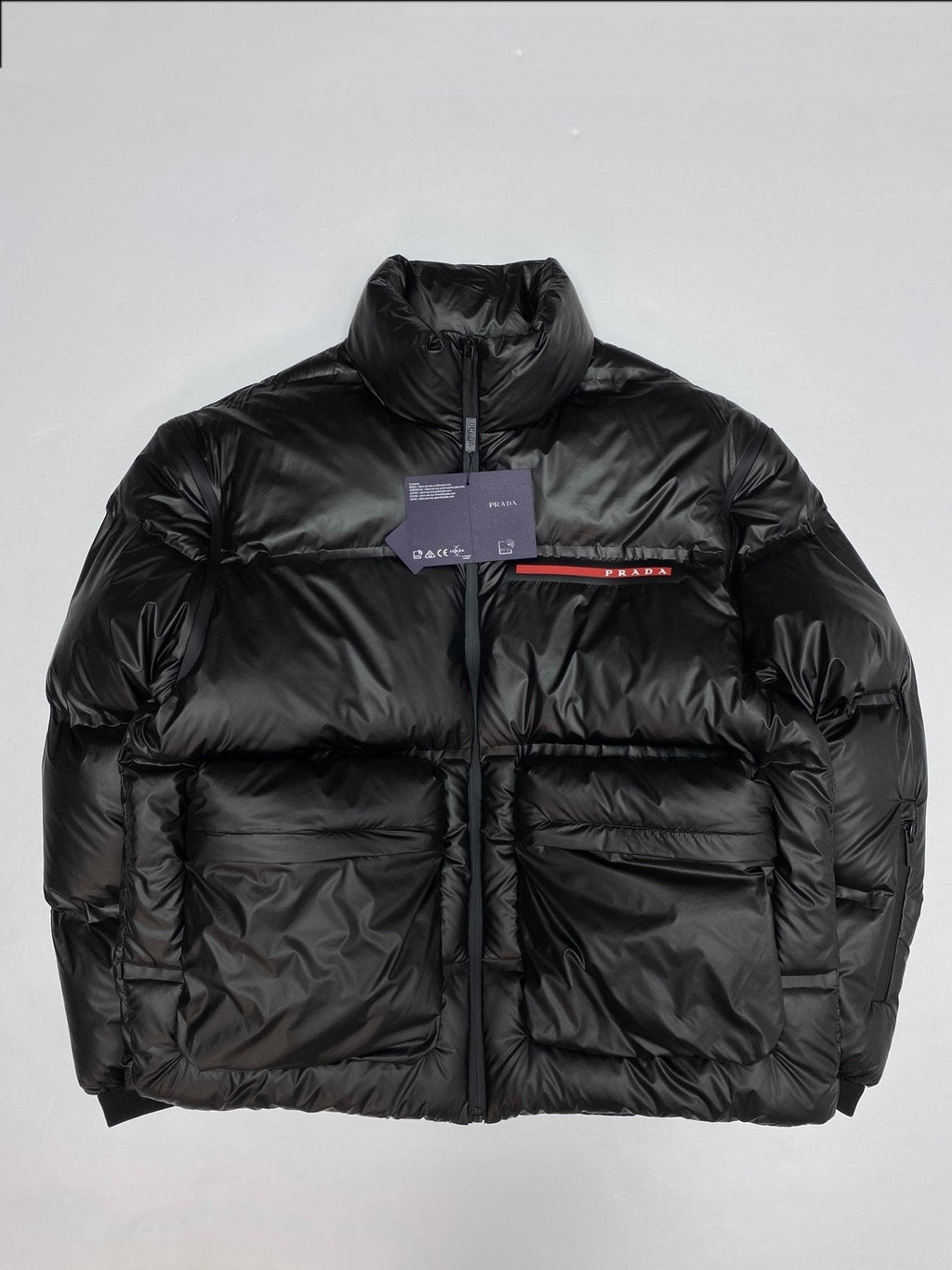 Prada Black Convertible Puffer Jacket with Red Chest Stripe — front