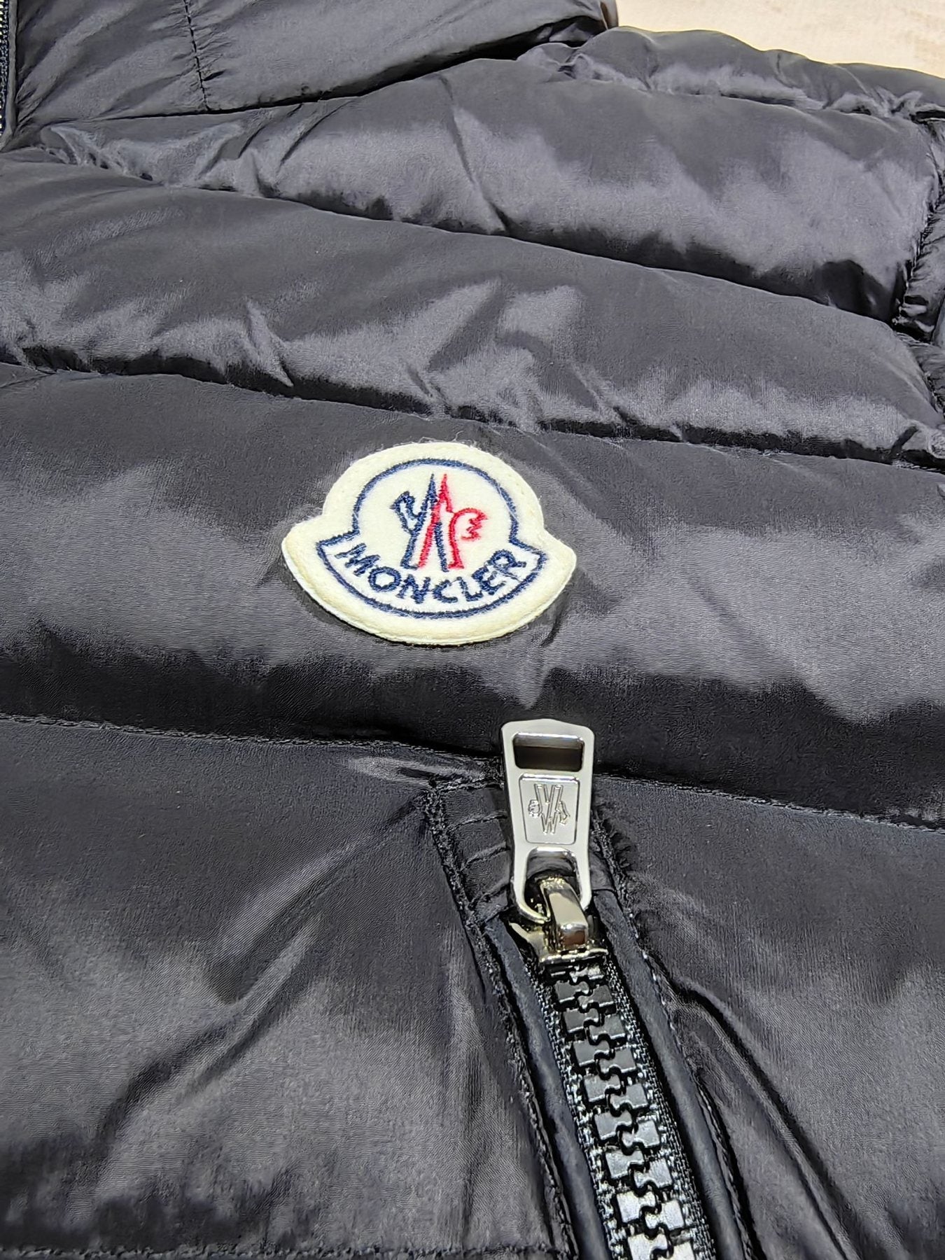 Moncler Hidden Lettering Down Vest — detail