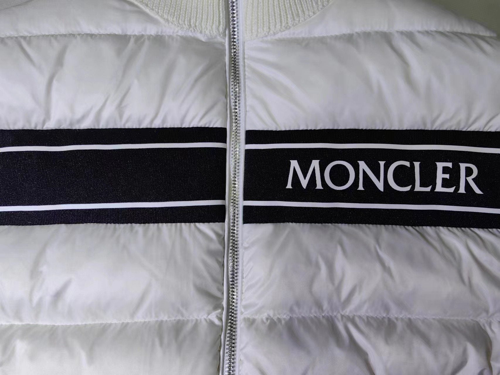 Moncler Quilted Knit-Sleeve Down Jacket — detail