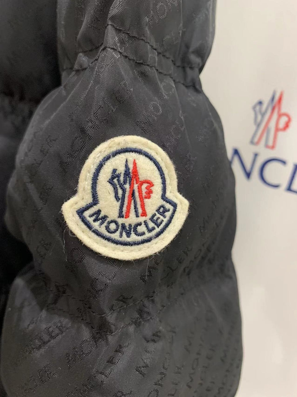 Moncler Multi-Pocket Quilted Puffer Coat — fabric_closeup