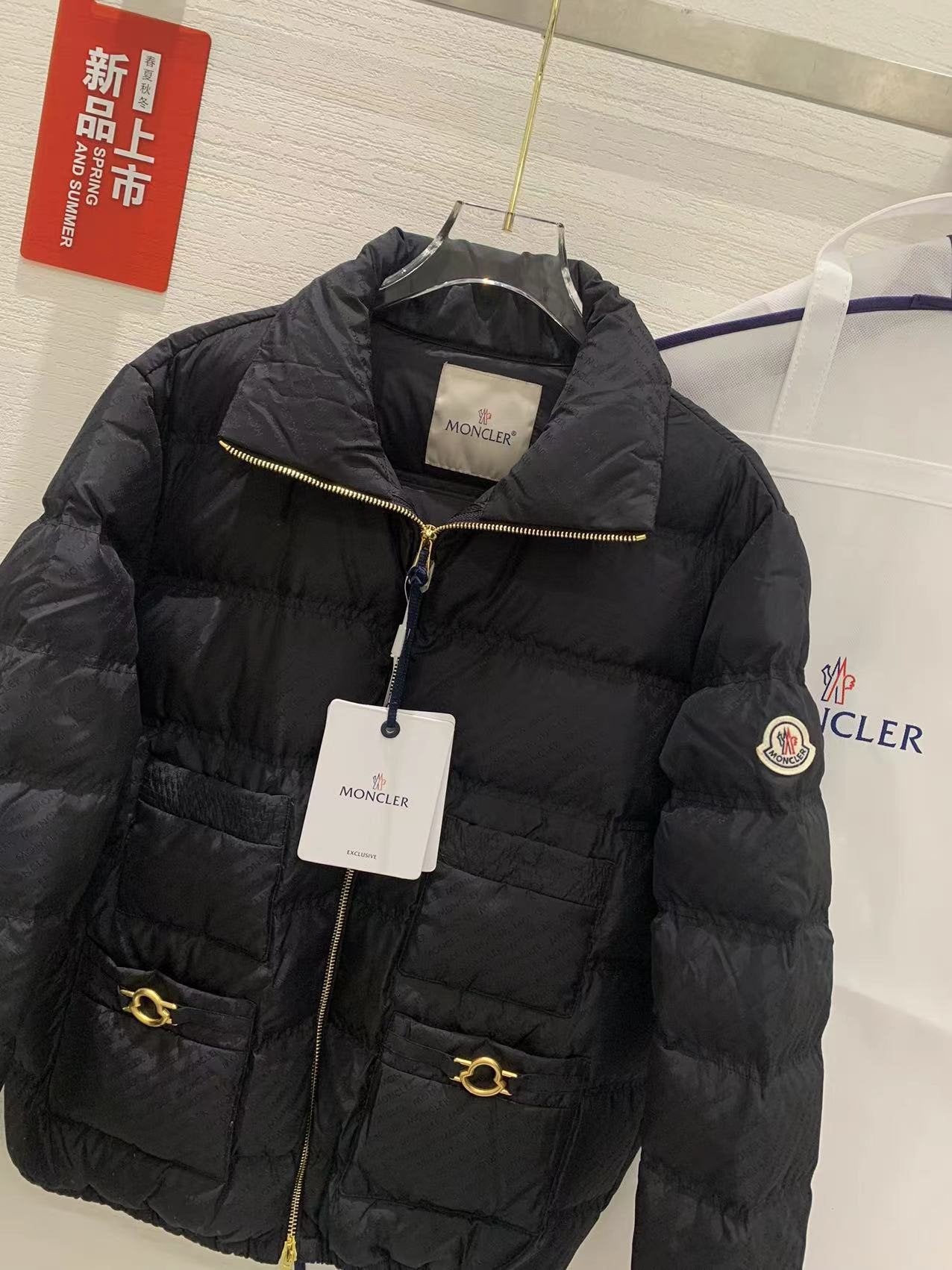 Moncler Multi-Pocket Quilted Puffer Coat — detail