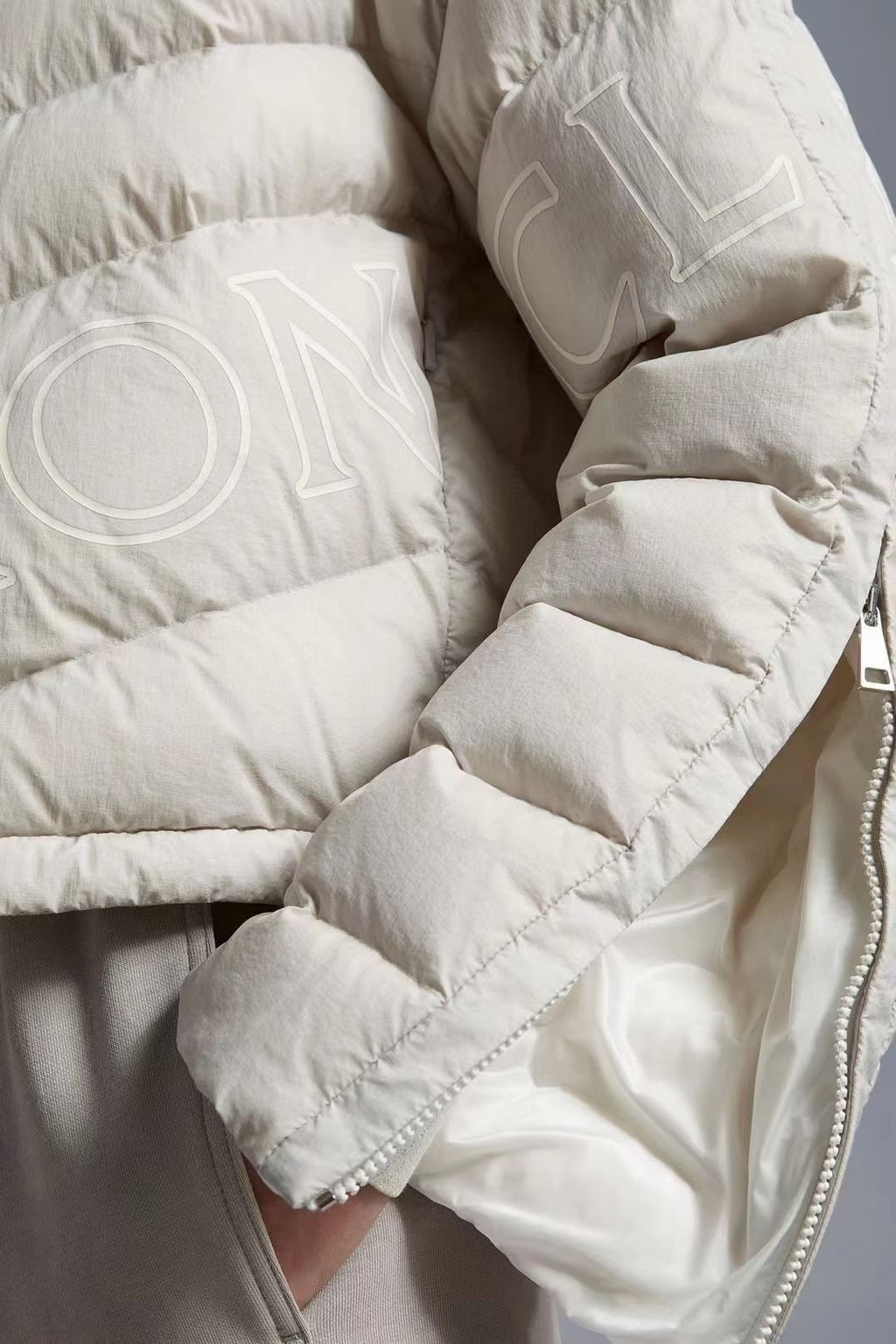 Moncler Letter Graphic Cropped Puffer Coat — fabric_closeup