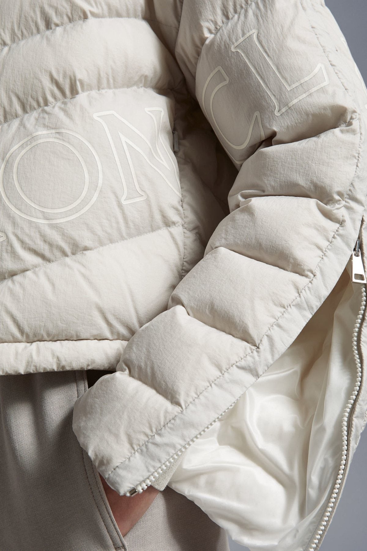 Moncler Letter Graphic Cropped Puffer Coat — fabric_closeup