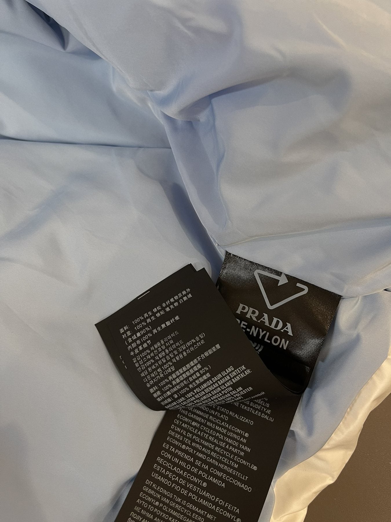 Prada Reversible Quilted Zip Vest — neck_label