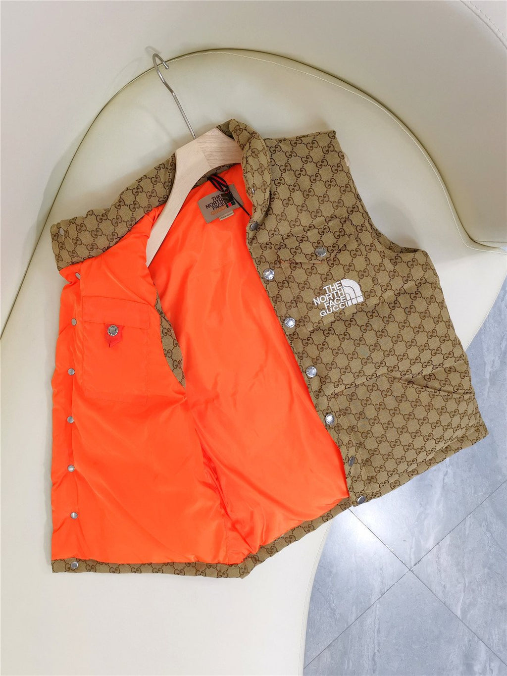 GUCCI Brown Monogram Hooded Down Vest — detail