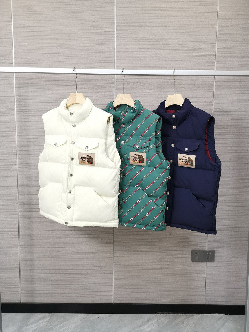 The North Face Gucci Padded Snap-Front Vest — comparison