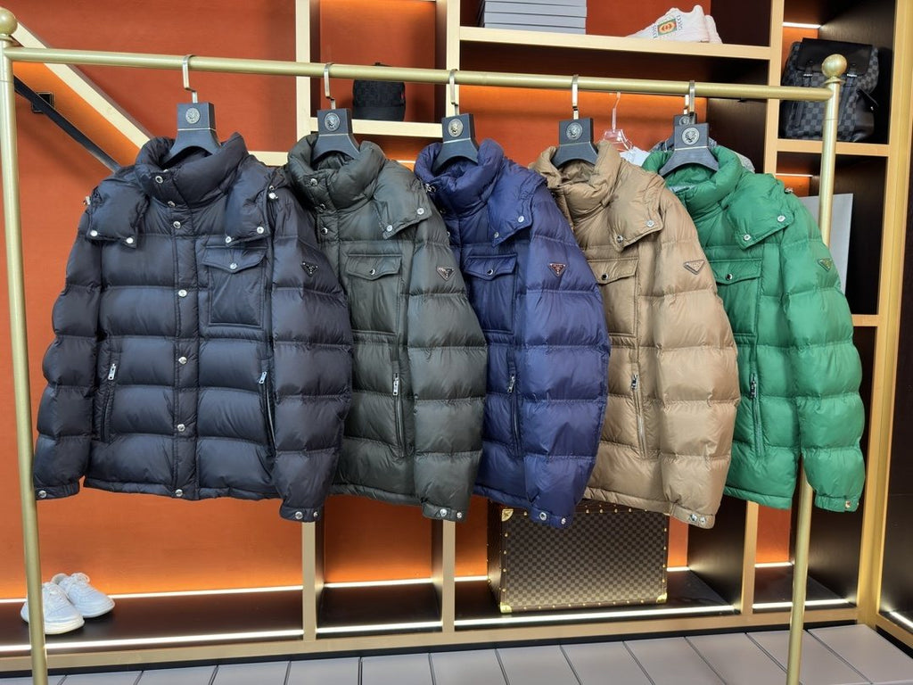 Prada Hooded Quilted Puffer Jacket — comparison