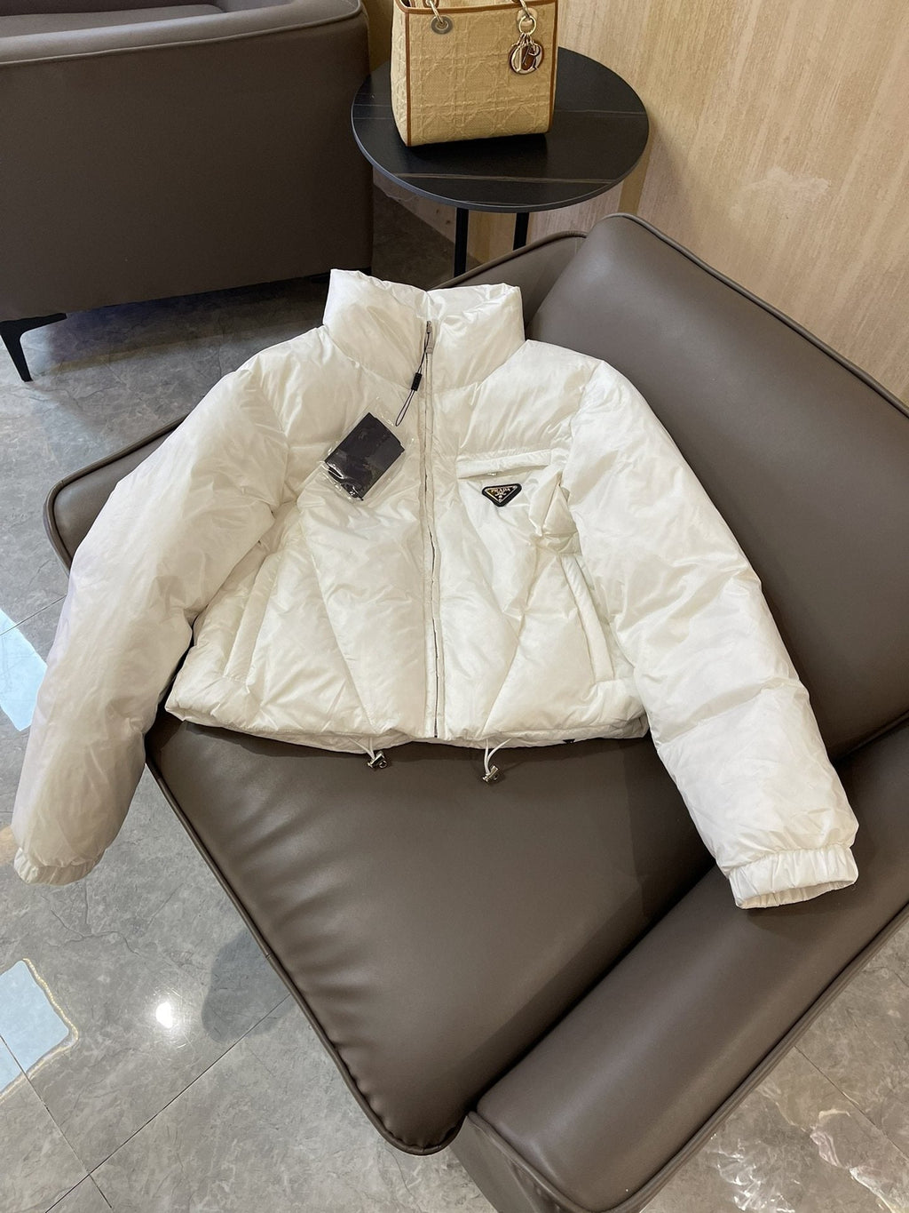 Prada Triangle Plaque Short Down Jacket — hero
