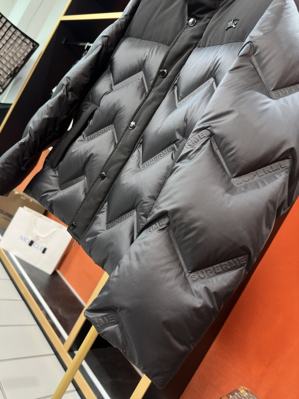 Burberry Hooded Equestrian Logo Puffer Jacket — detail
