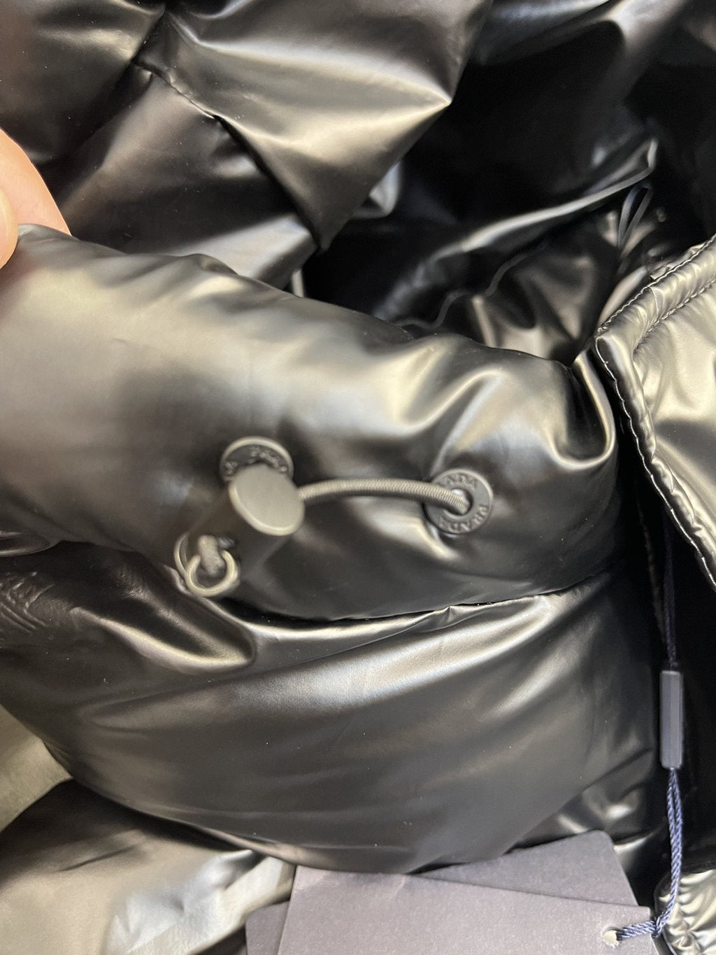 Prada Black Hooded Quilted Puffer Jacket — detail