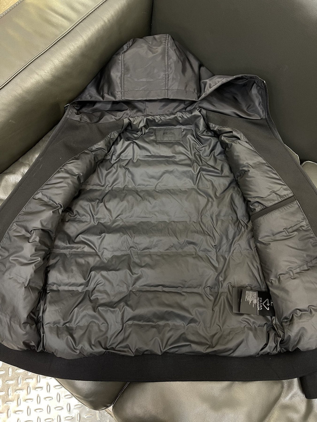 Prada Black Hooded Full-Zip Jacket with Triangle Chest Badge — detail