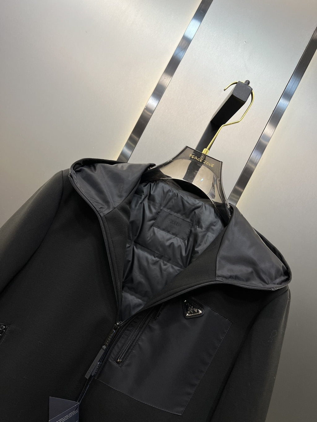 Prada Black Hooded Full-Zip Jacket with Triangle Chest Badge — detail