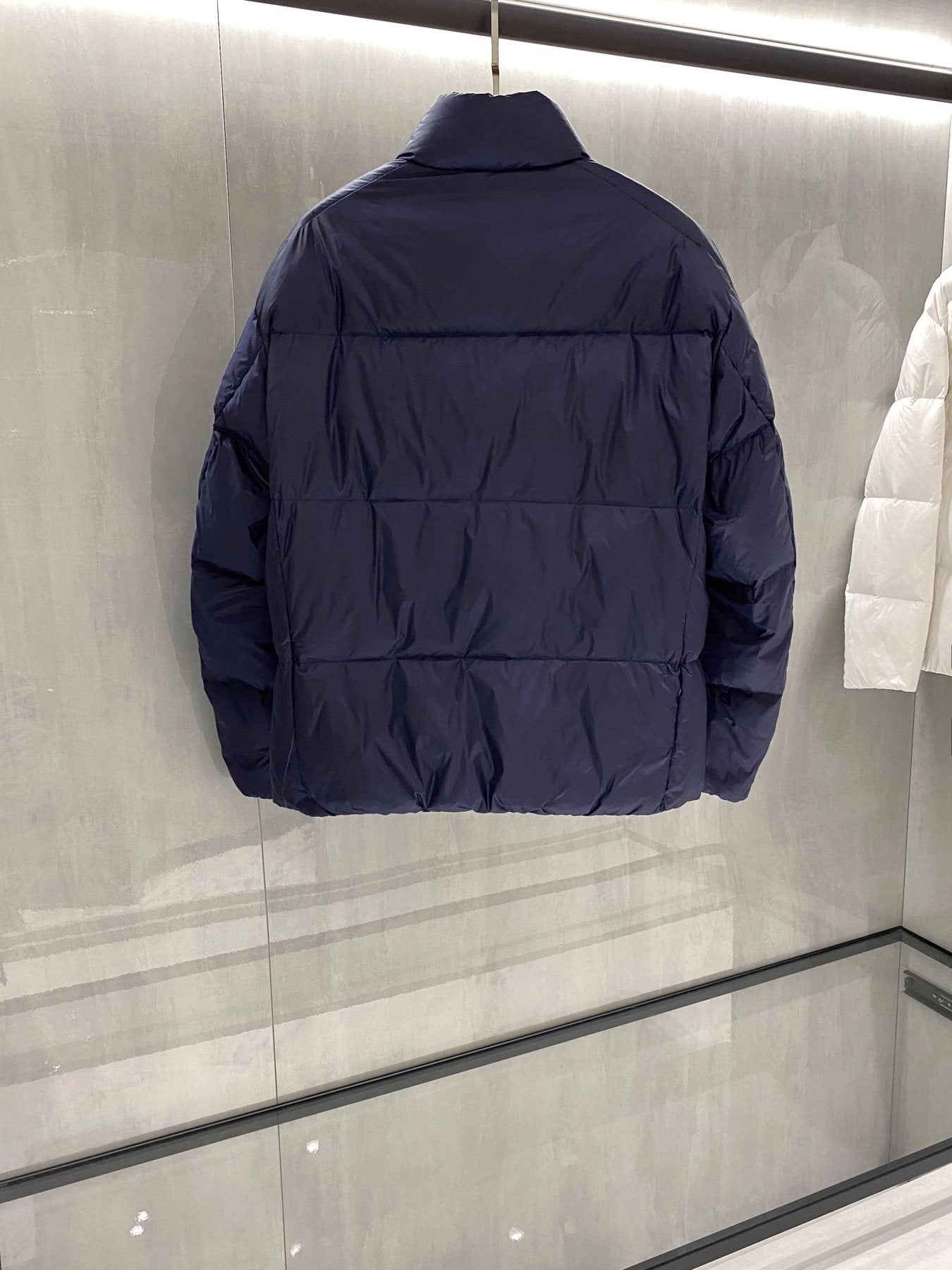 Prada Quilted Triangle Badge Puffer Jacket — back