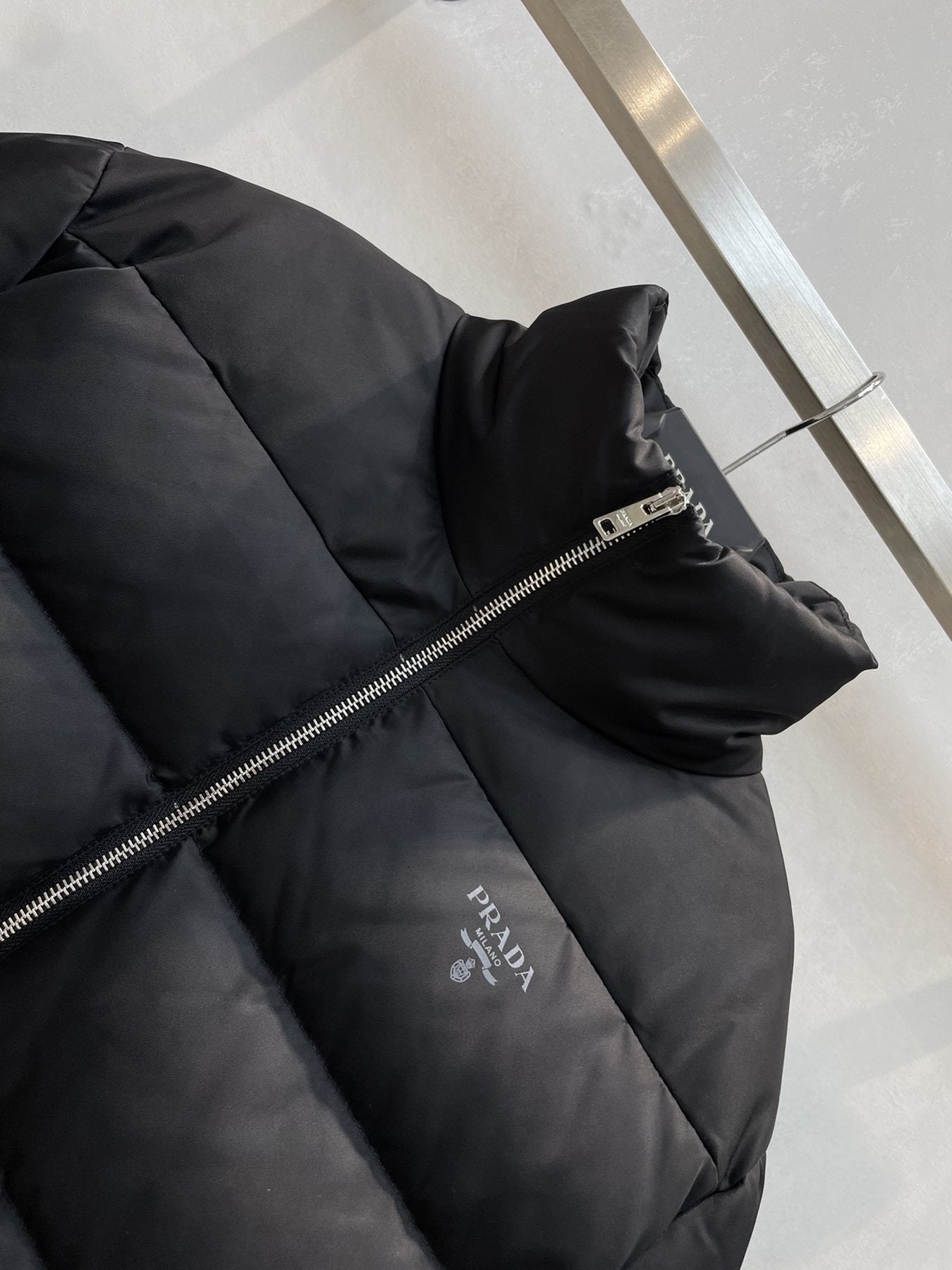 Prada Black Quilted Logo Puffer Jacket — detail