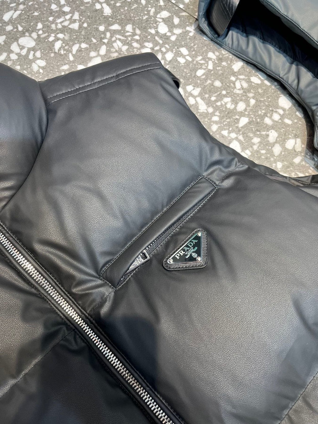 Prada Triangle Badge Padded Vest — detail