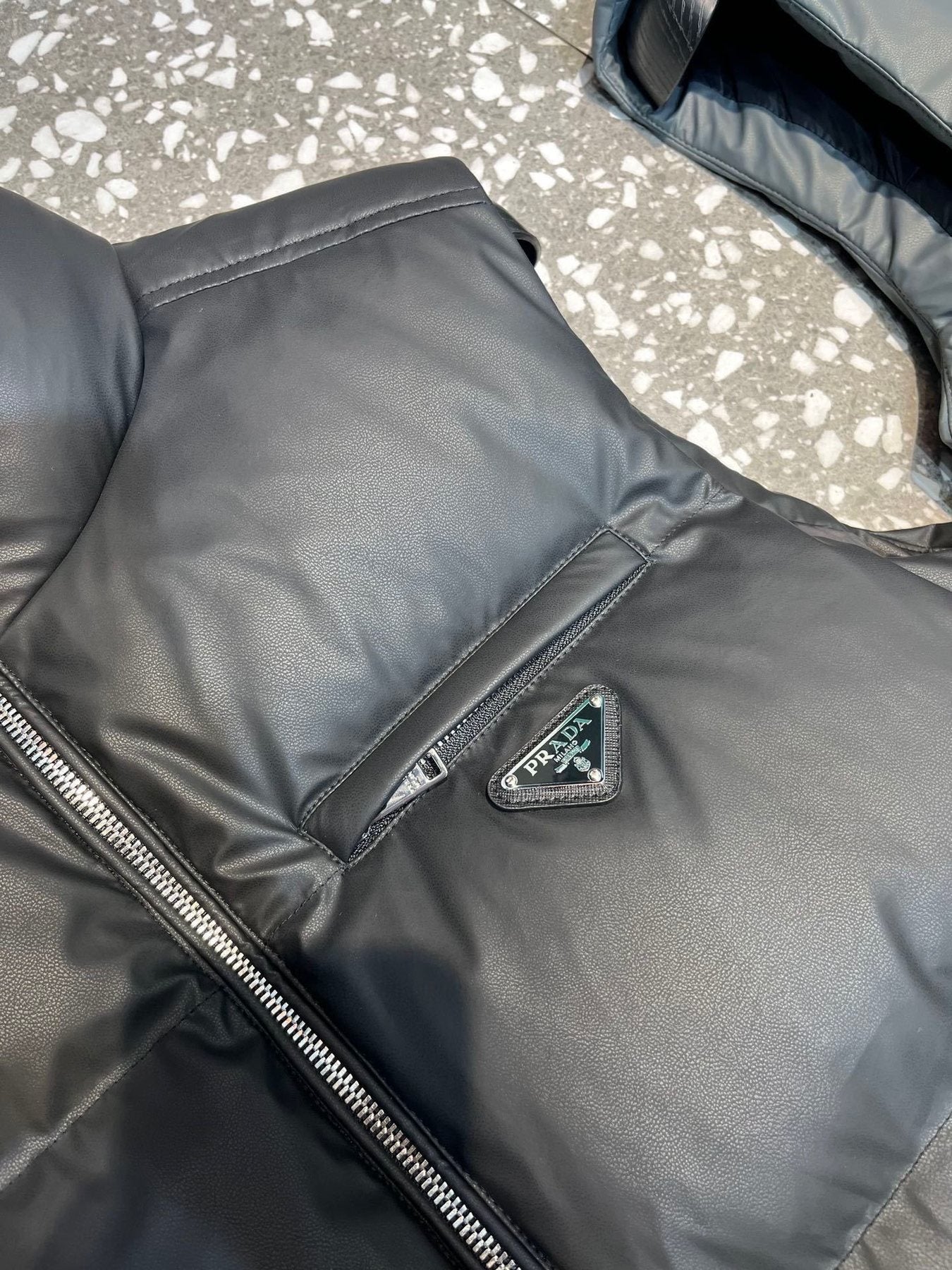 Prada Triangle Badge Padded Vest — detail