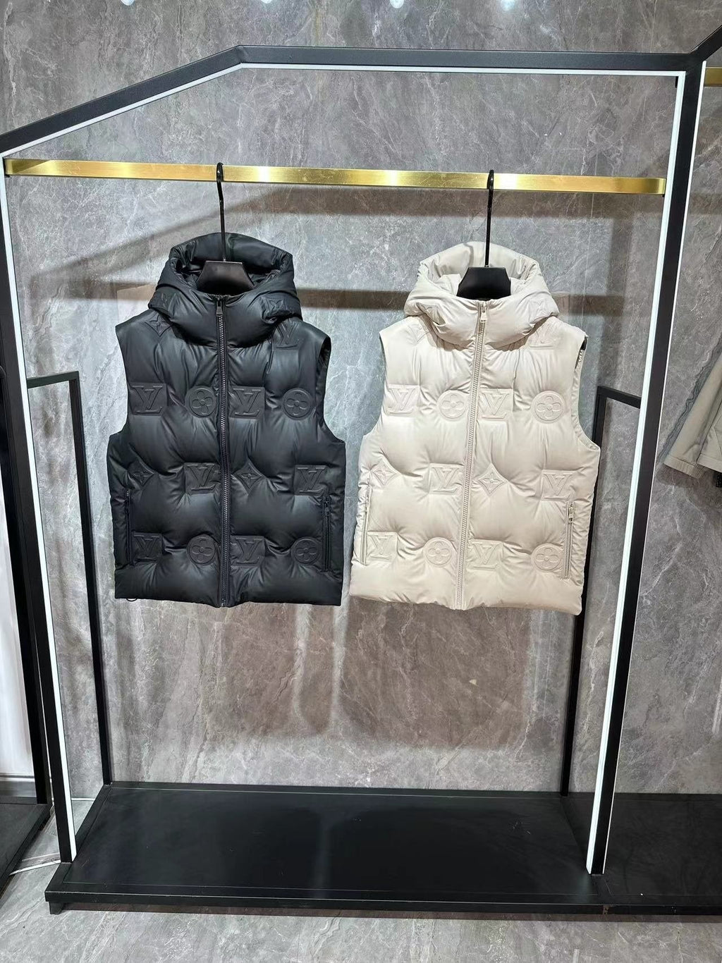 LV Tonal Monogram Hooded Quilted Vest — comparison