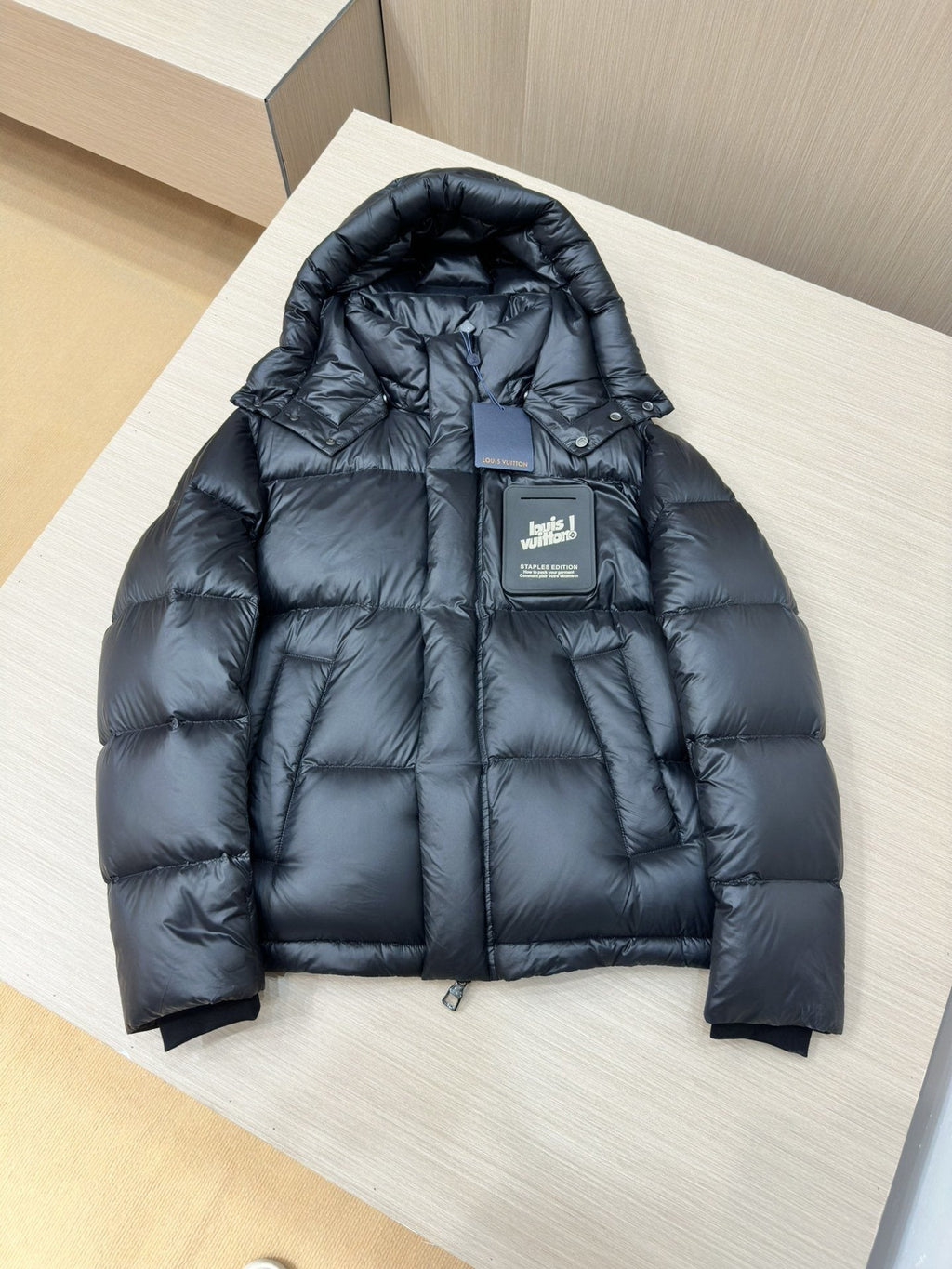 LV Black Hooded Puffer Coat with Monogram Lining — hero