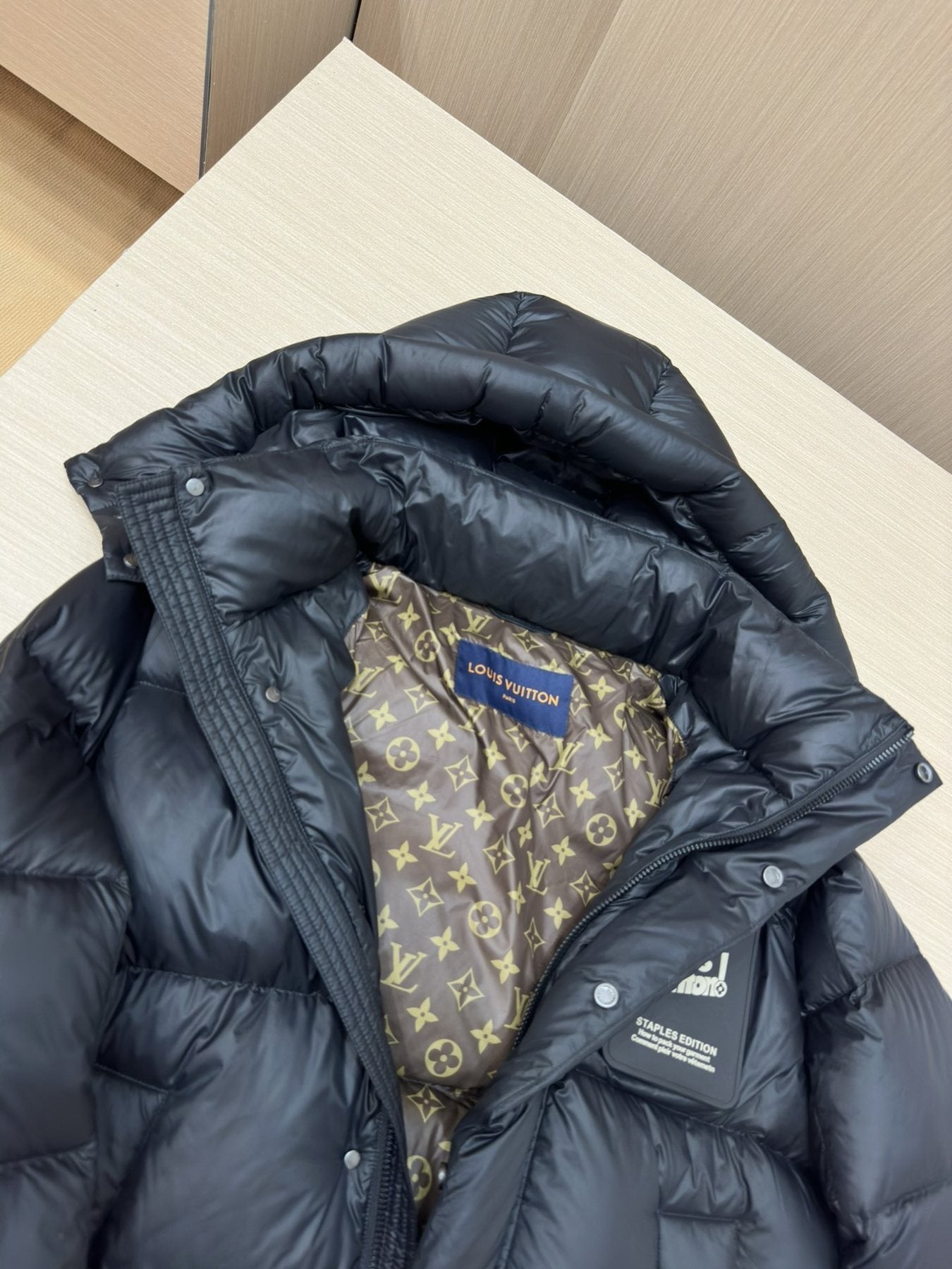 LV Black Hooded Puffer Coat with Monogram Lining — detail