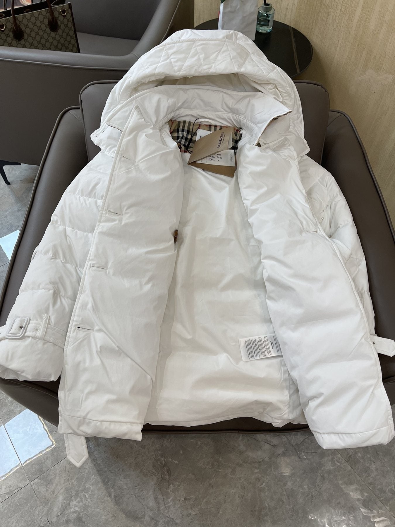 Burberry Belted Hooded Quilted Down Jacket — neck_label
