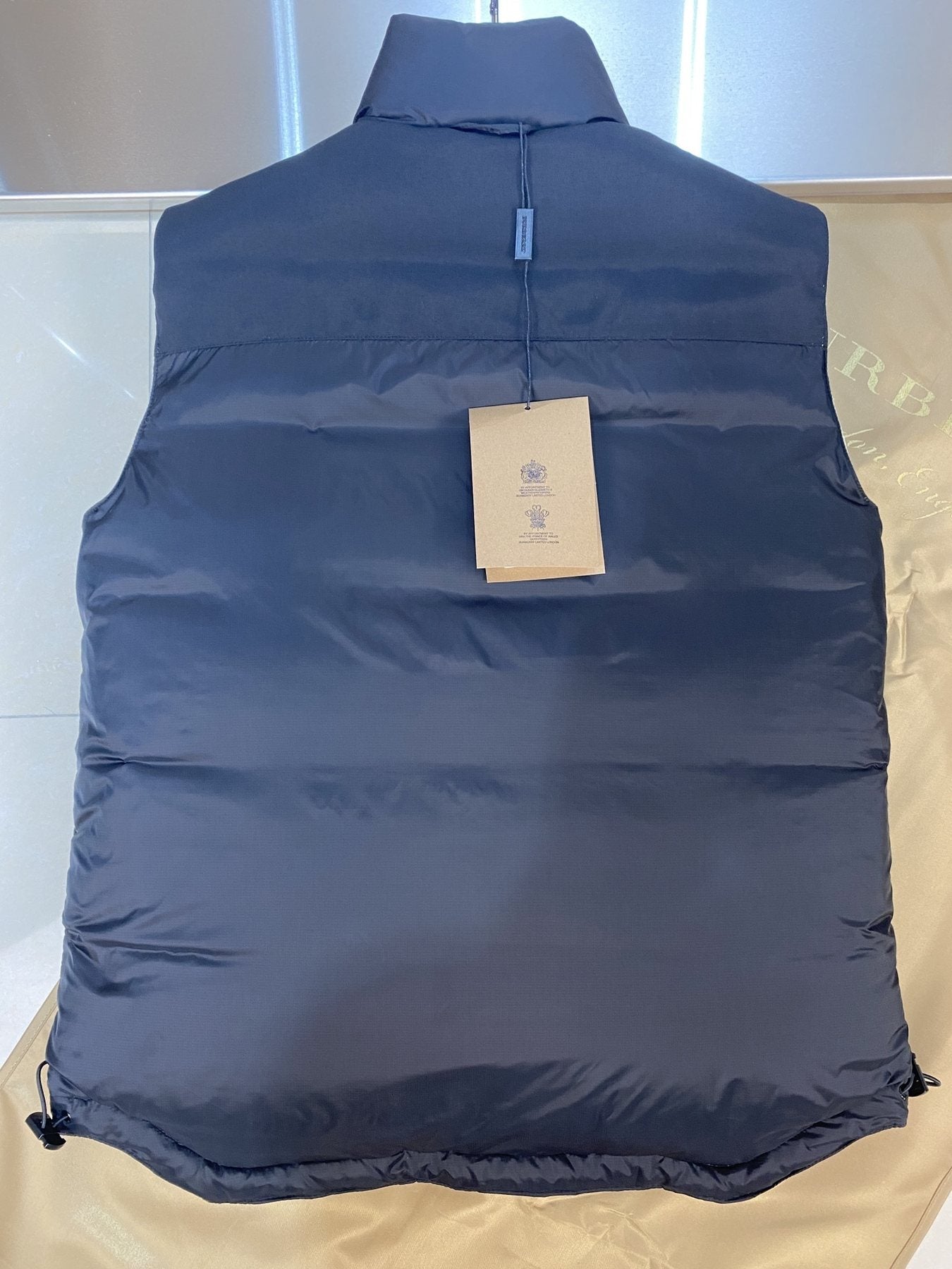 Burberry Reversible Check Quilted Vest — hang_tag