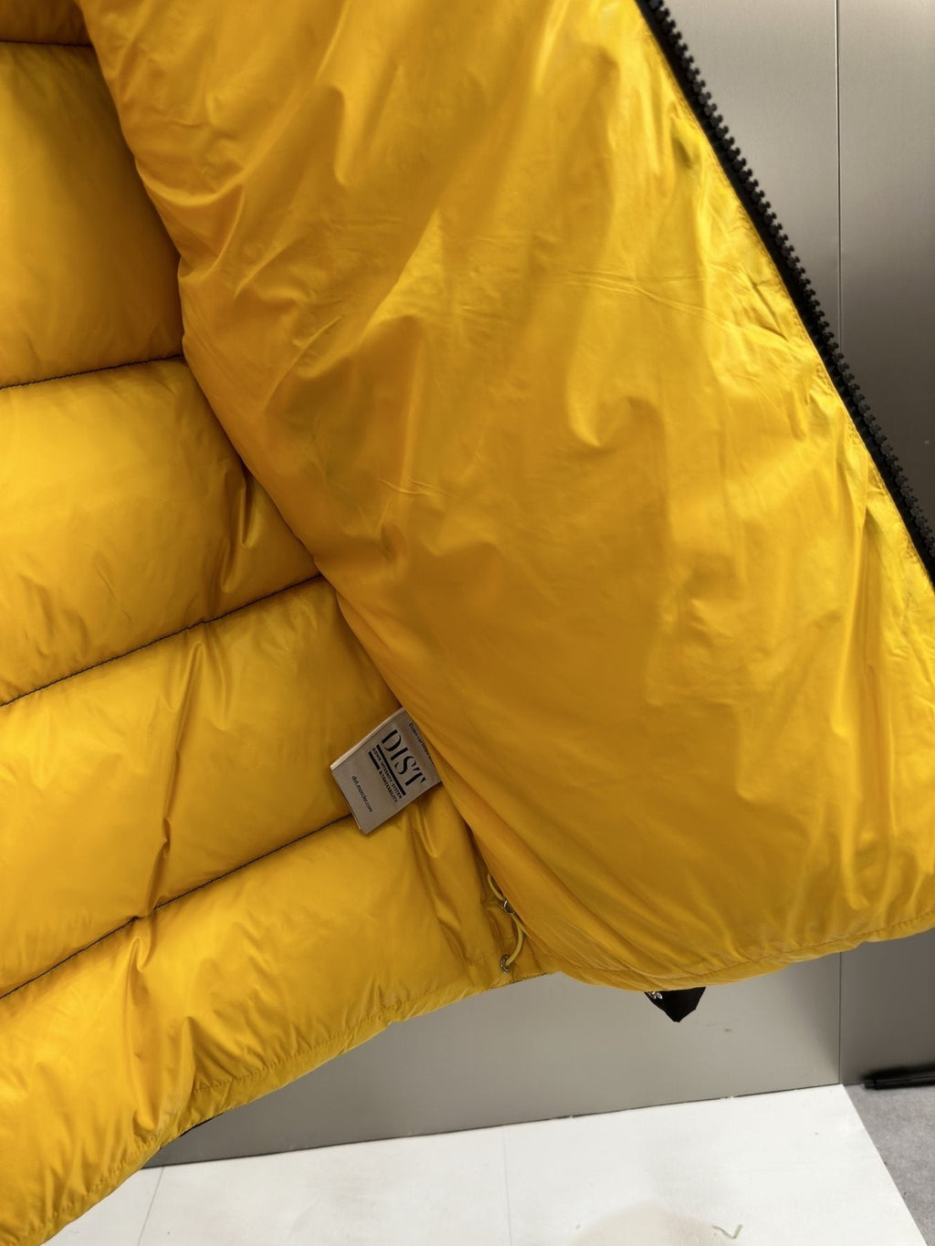 Moncler Reversible Quilted Goose Down Coat — fabric_closeup