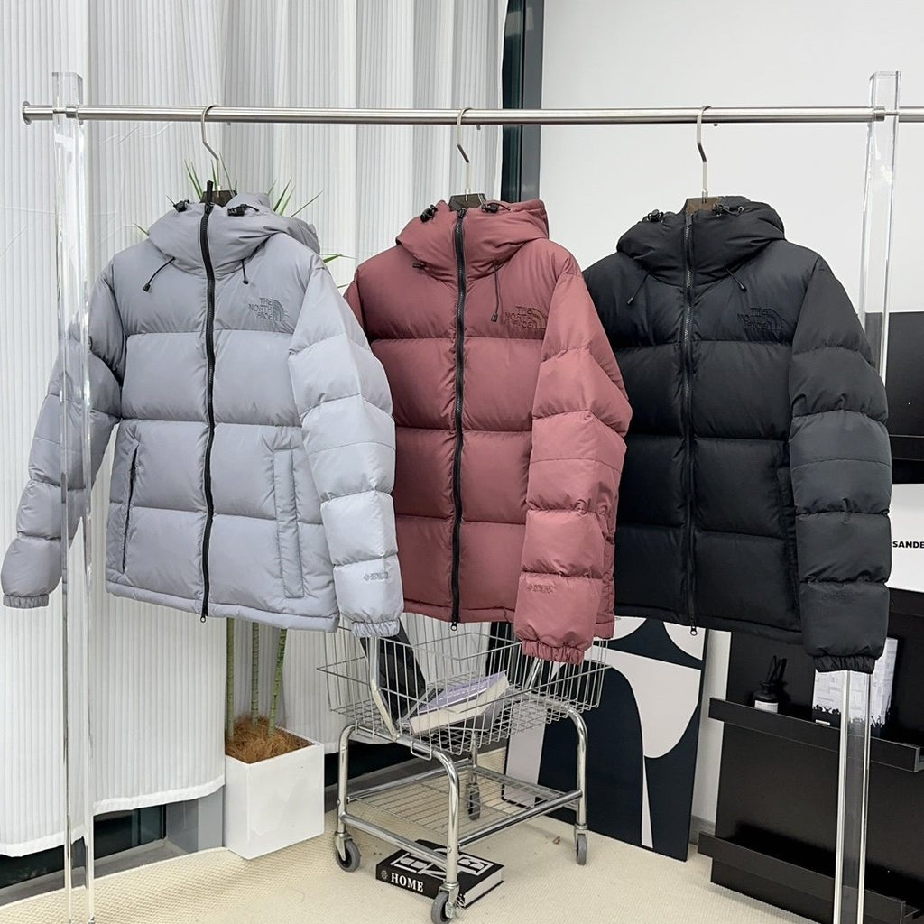 The North Face Hooded Puffer Jacket — comparison