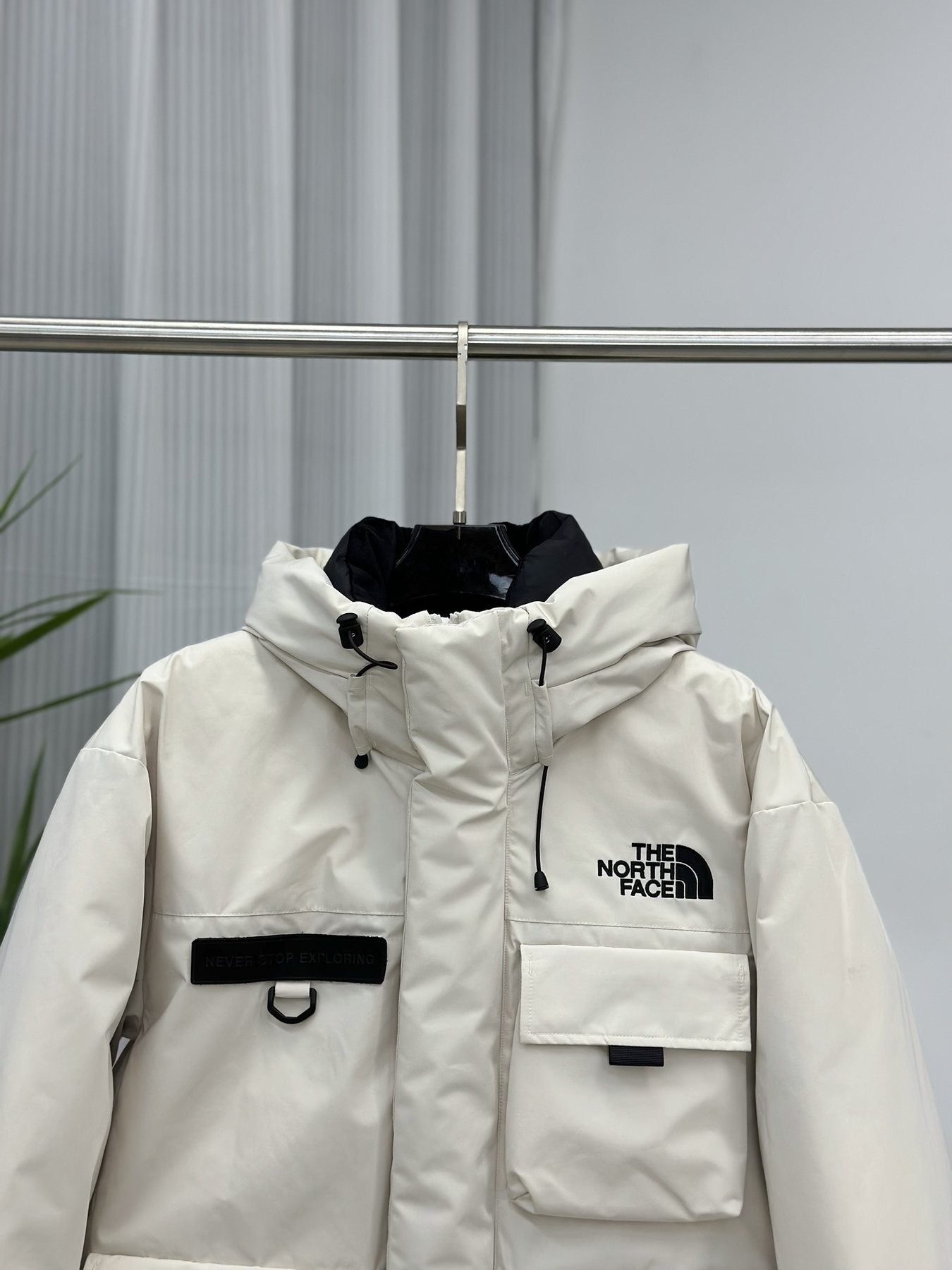 The North Face Hooded Utility Puffer Jacket — detail