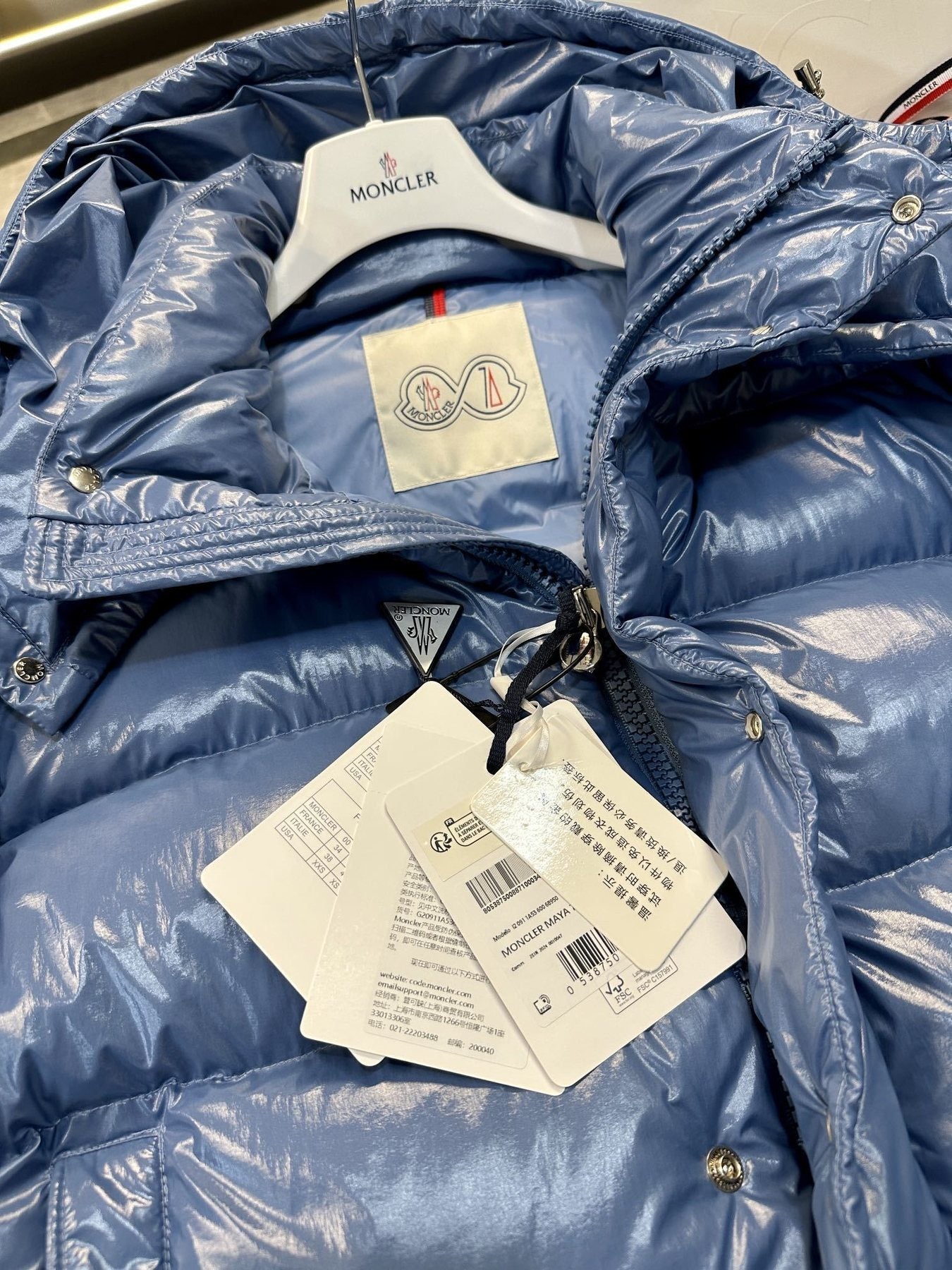Moncler Maya 70 High-Shine Hooded Puffer Coat — hang_tag
