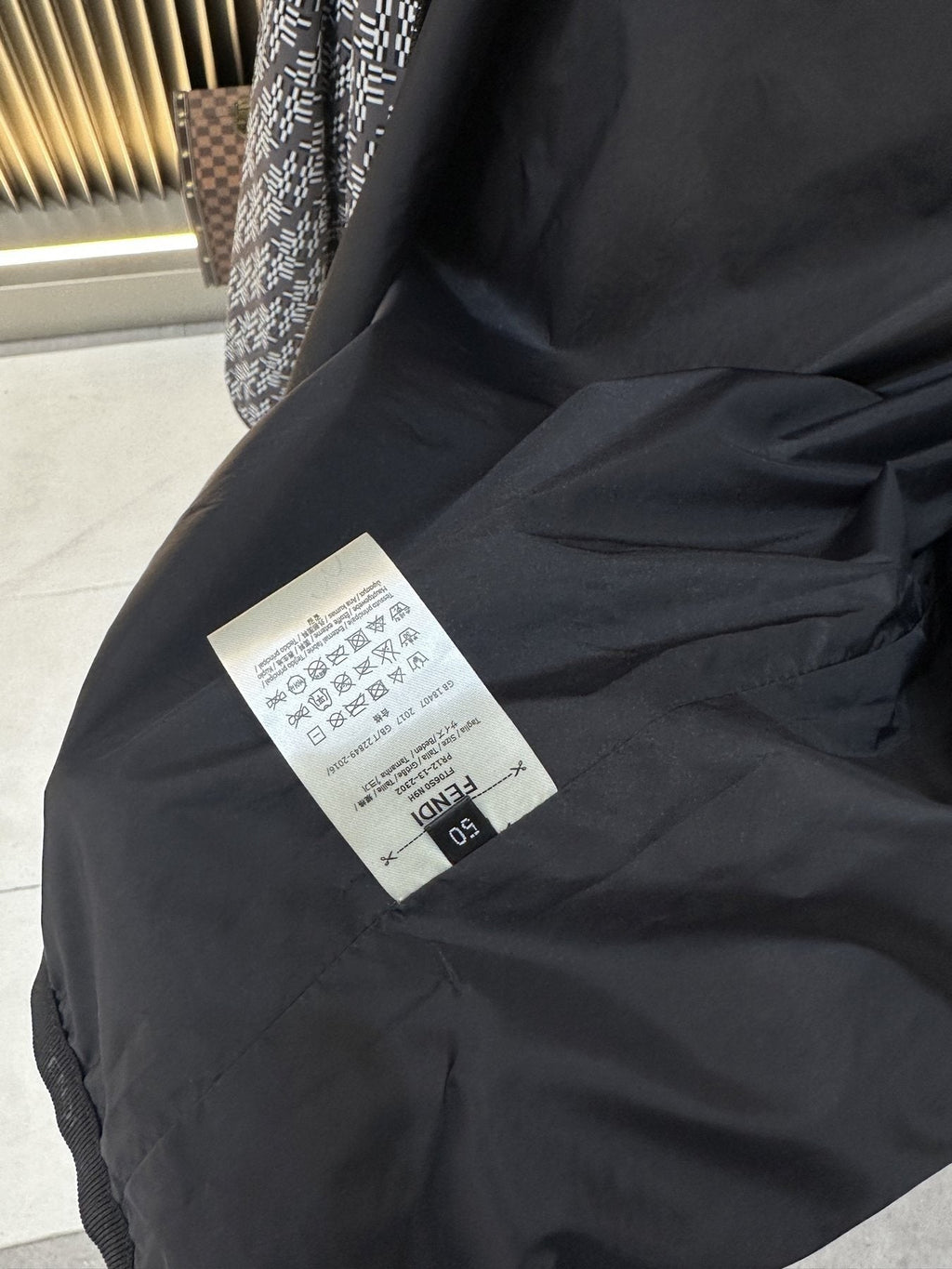 Fendi Black and White Pattern Hooded Zip-Front Jacket — hang_tag