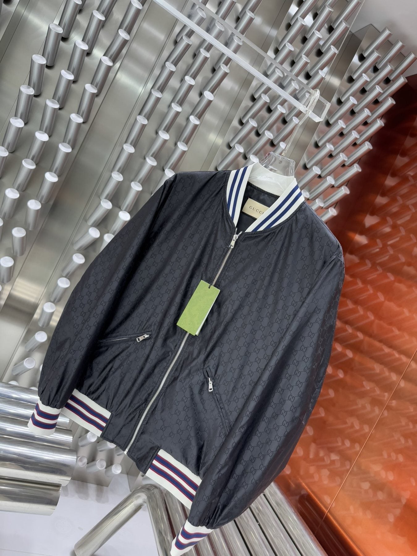 Gucci Allover Monogram Bomber Jacket — hang_tag