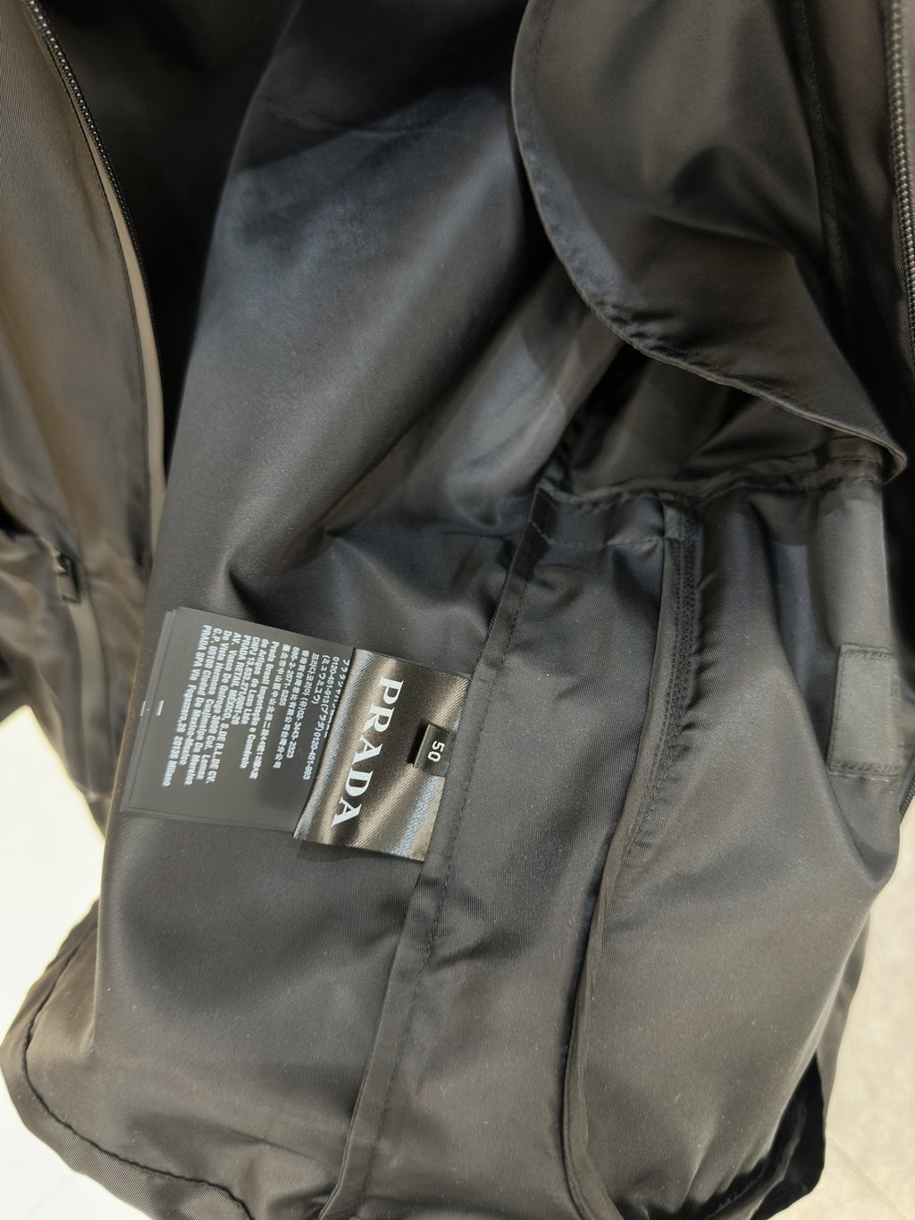 Prada Utility Pocket Zip Jacket — hang_tag
