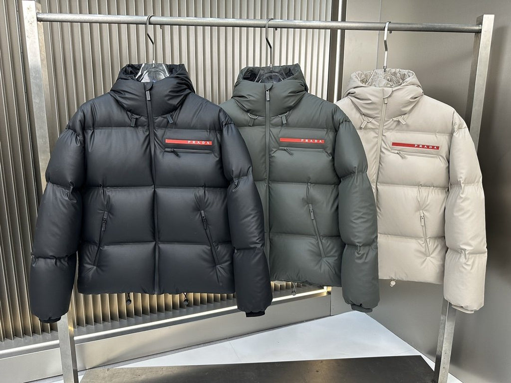 Prada Hooded Puffer Jacket with Red Chest Trim — comparison