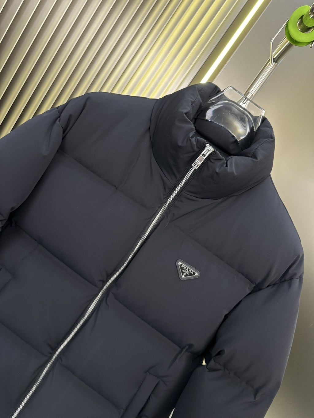 Prada Quilted Triangle-Badge Puffer Jacket — detail