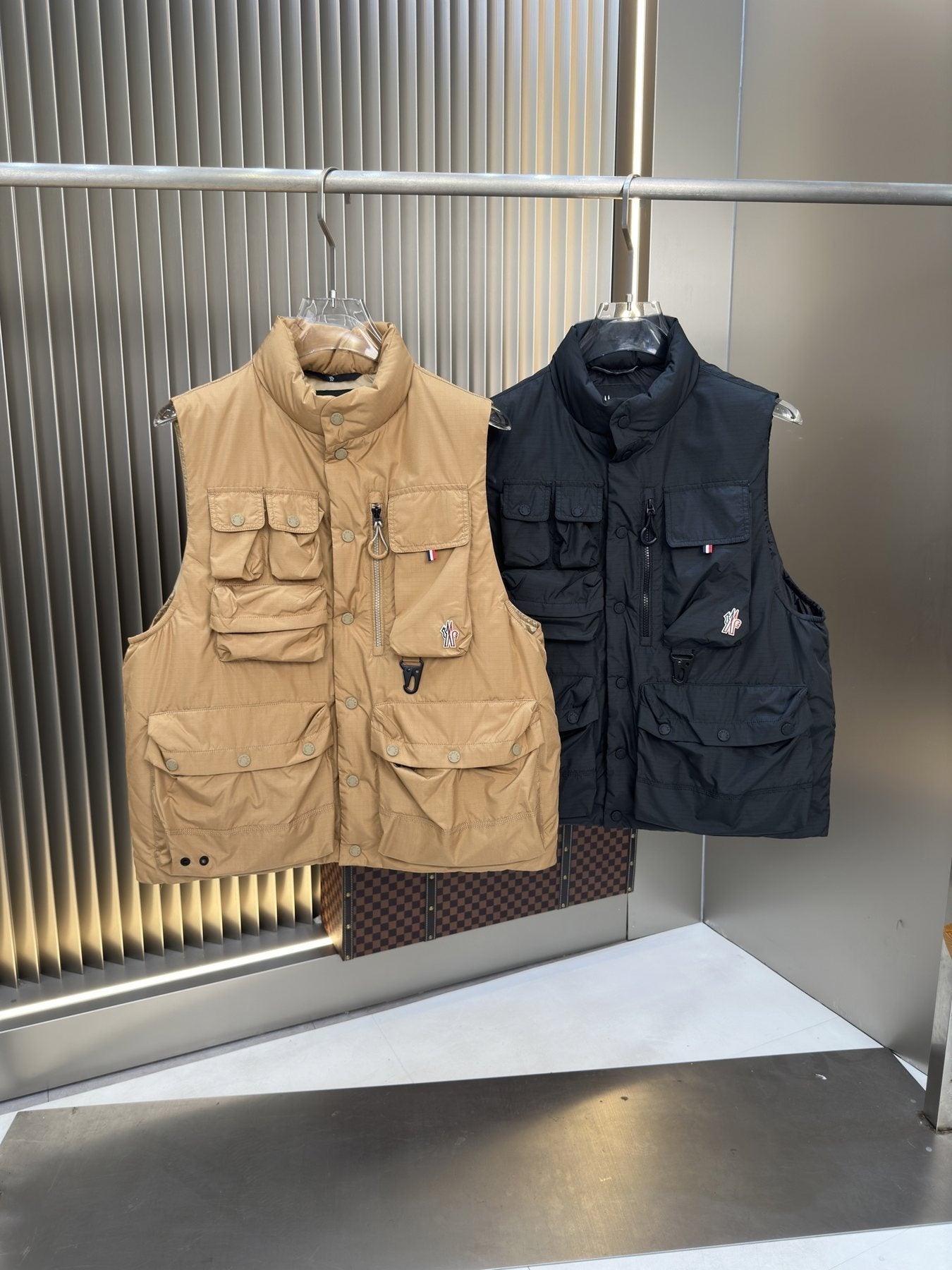 Moncler Quilted Utility Down Vest — comparison