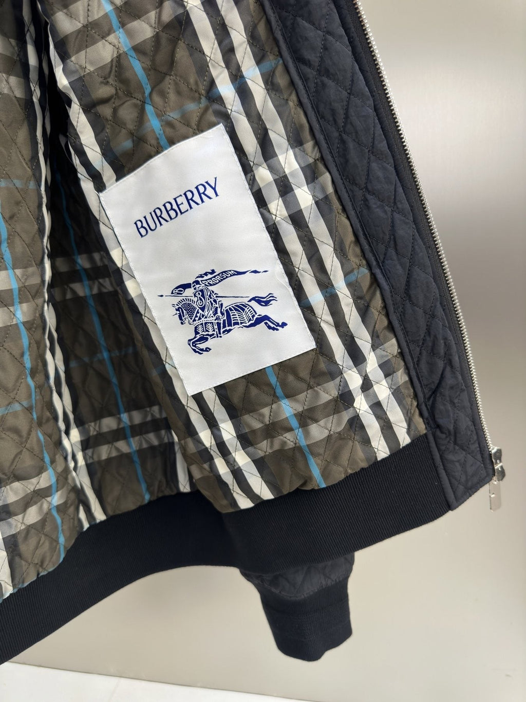 Burberry Navy Quilted Bomber Jacket — neck_label