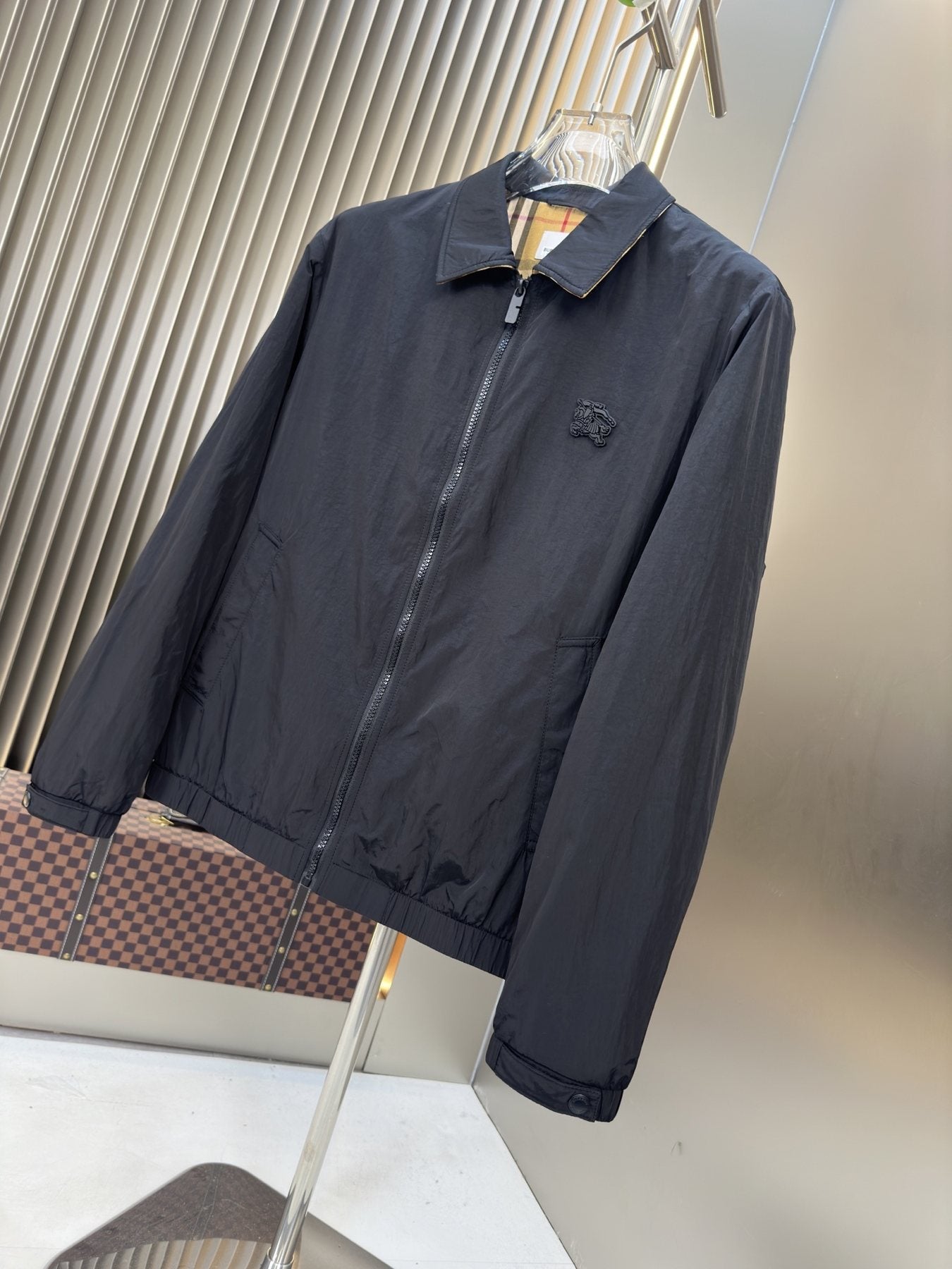 Moncler Black Zip-Front Jacket with Checked Lining — front
