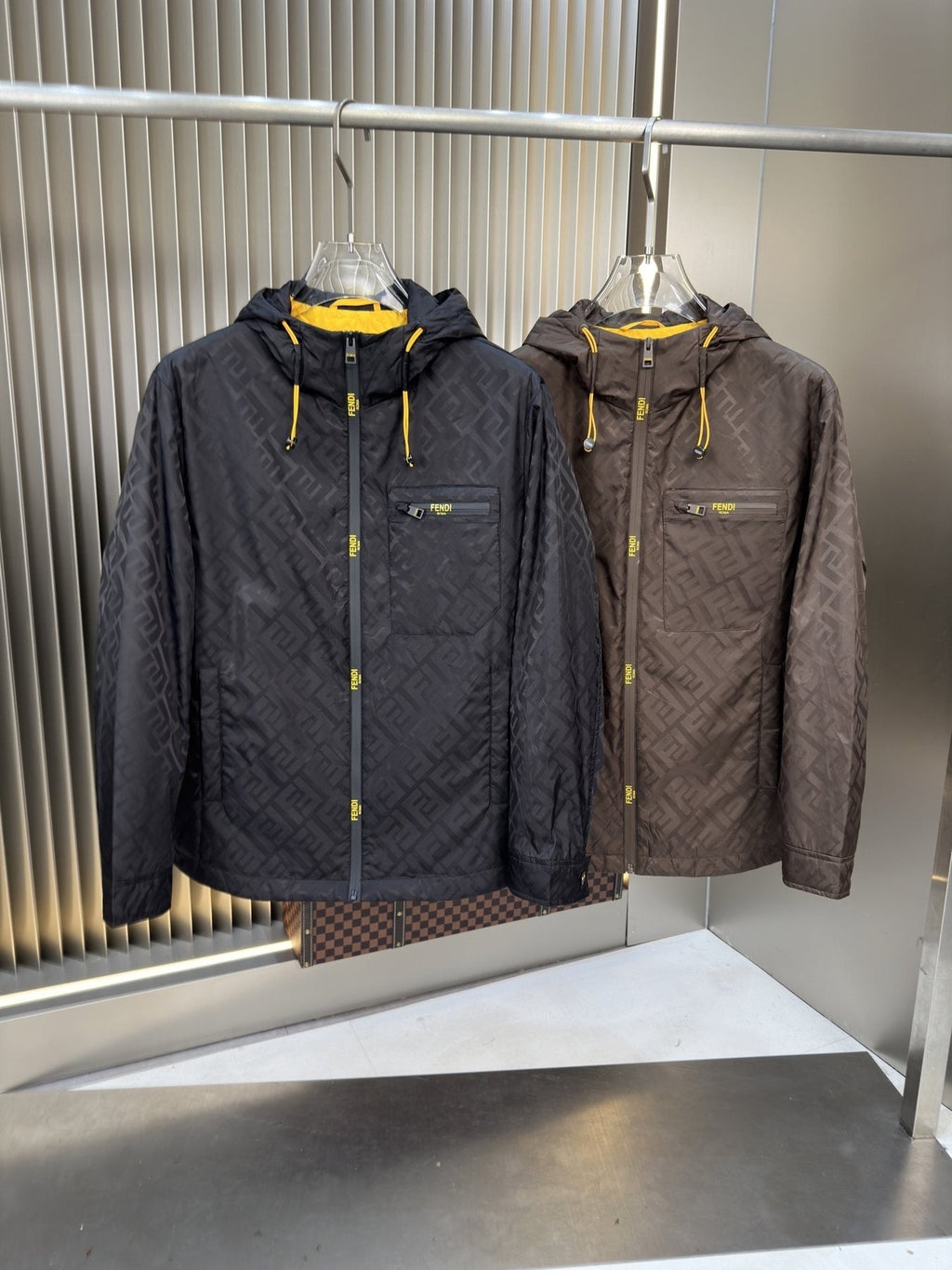 Fendi Monogram Hooded Jacket — comparison