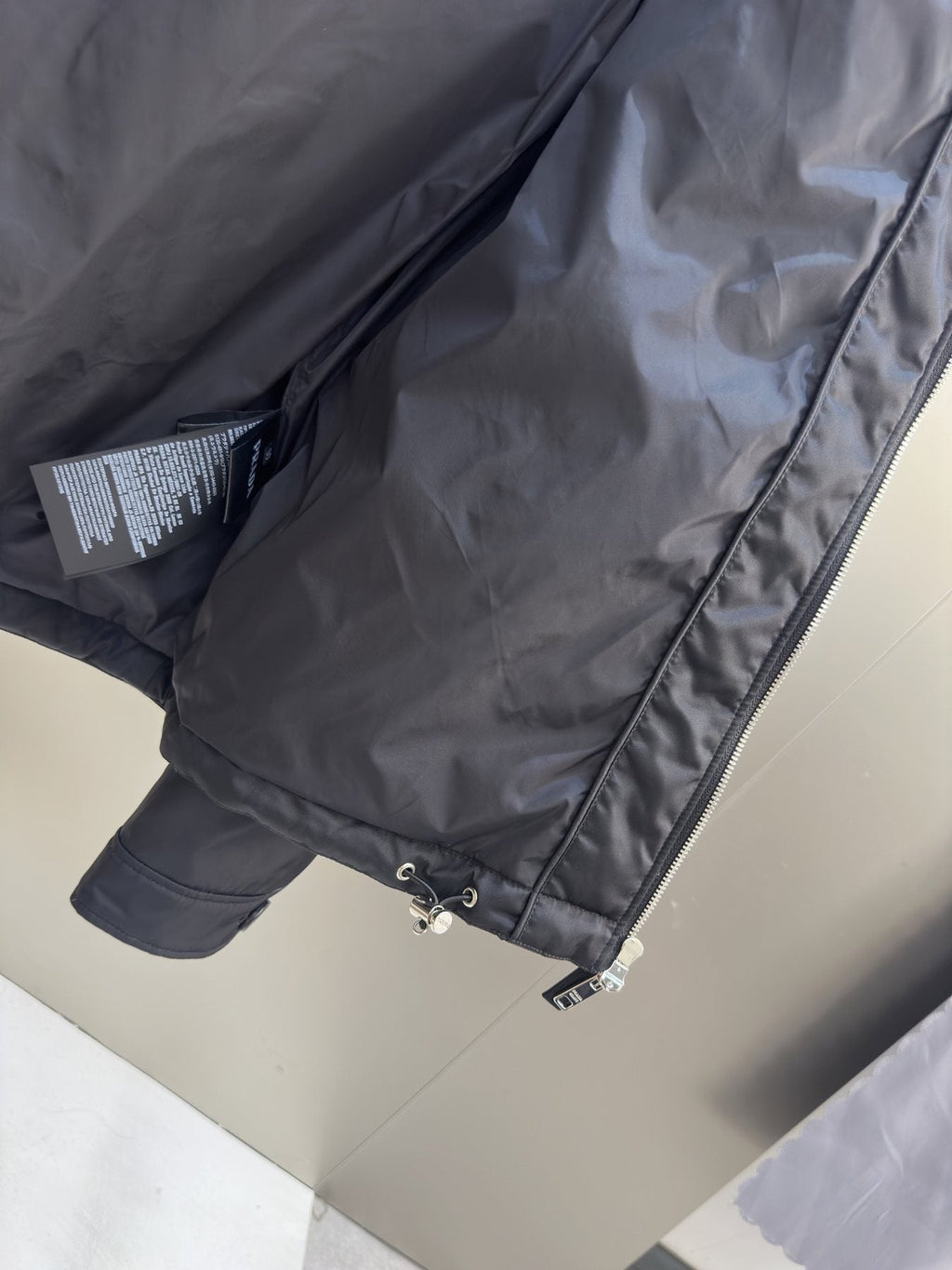 Prada Black Hooded Puffer Jacket — neck_label
