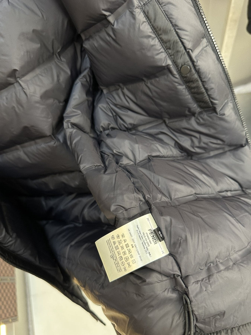 Fendi Black Hooded Puffer Jacket — hang_tag