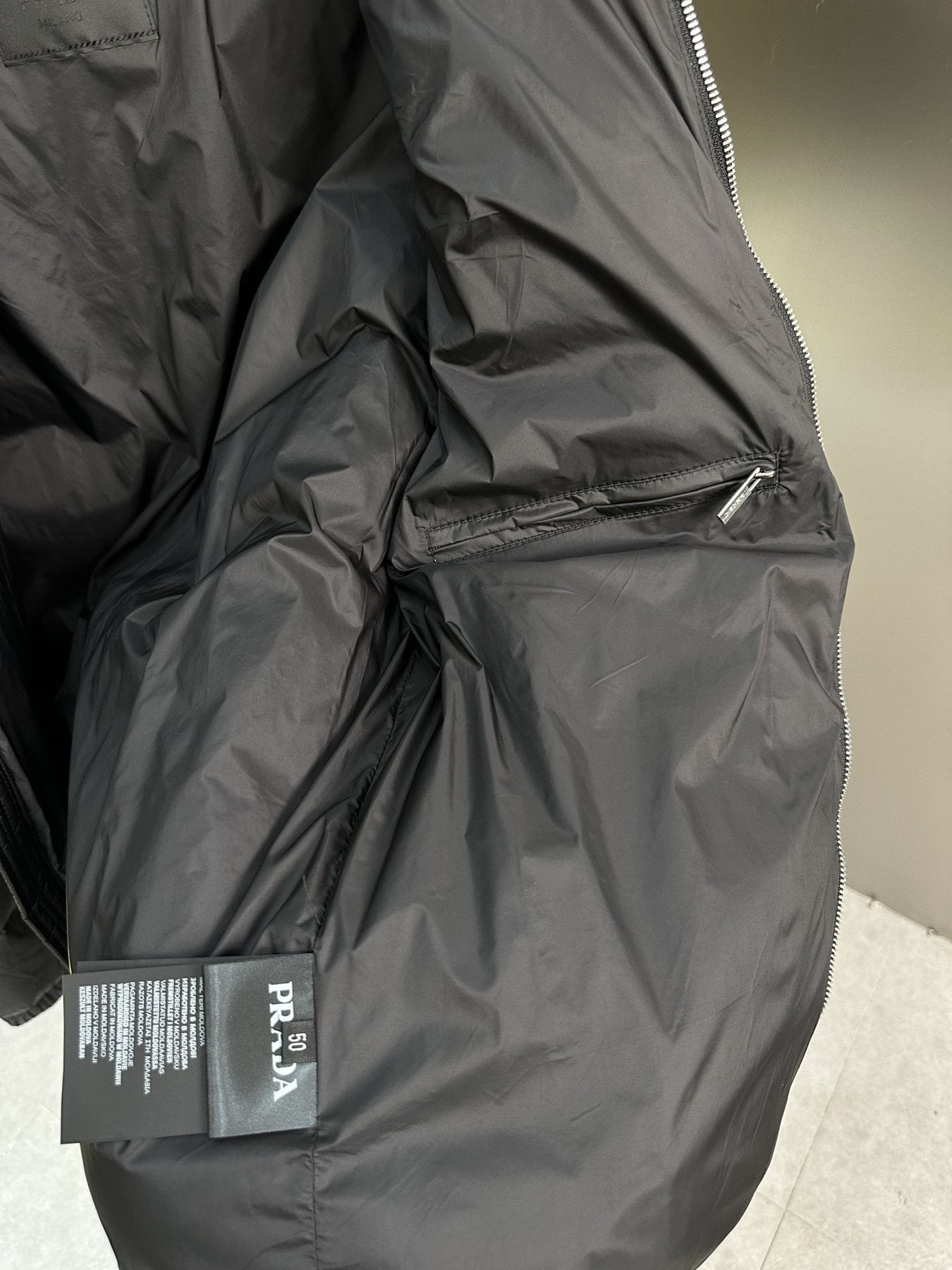 Prada Quilted Puffer Jacket — hang_tag