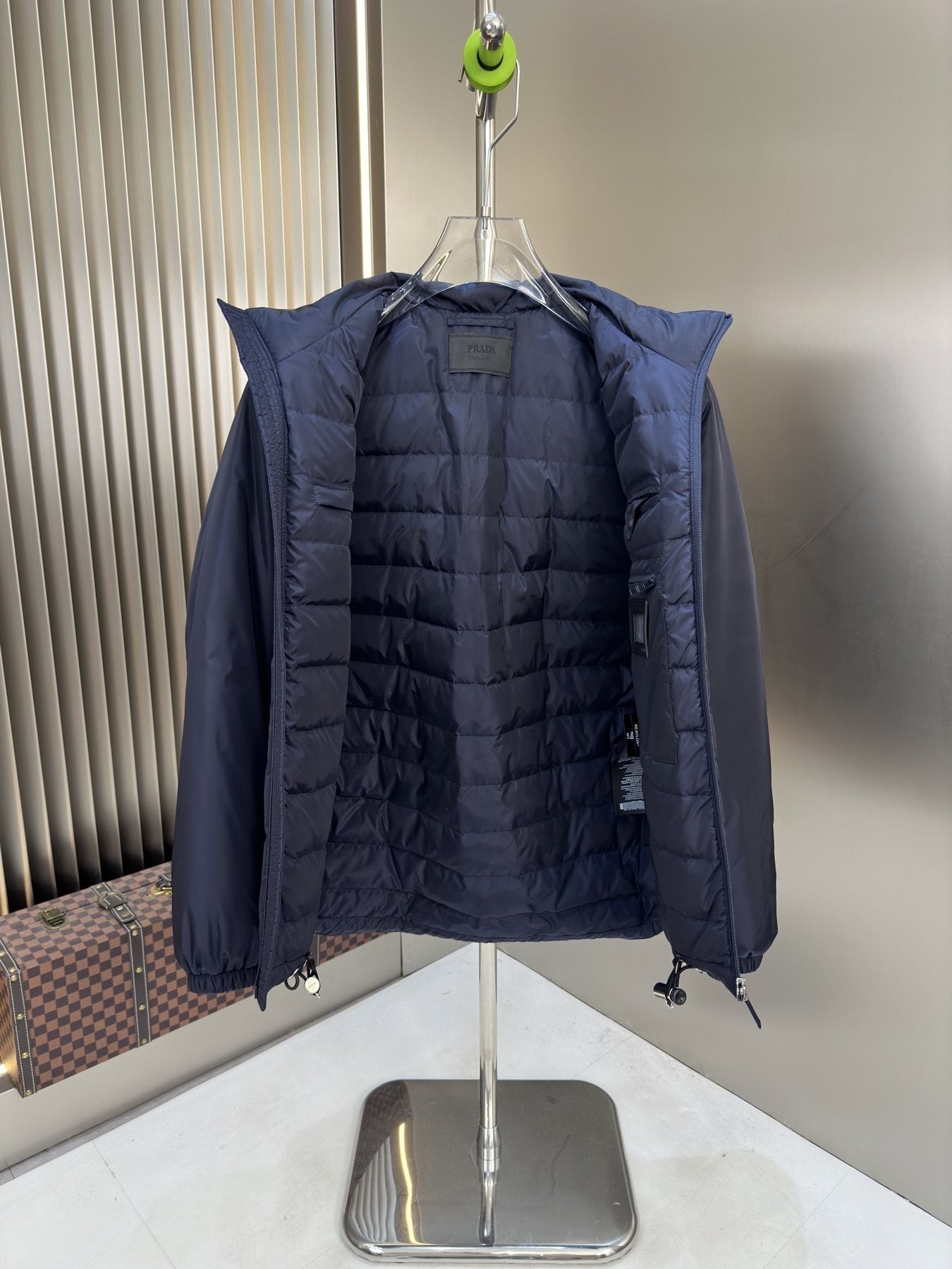Prada Hooded Puffer Jacket with Triangle Chest Badge — detail