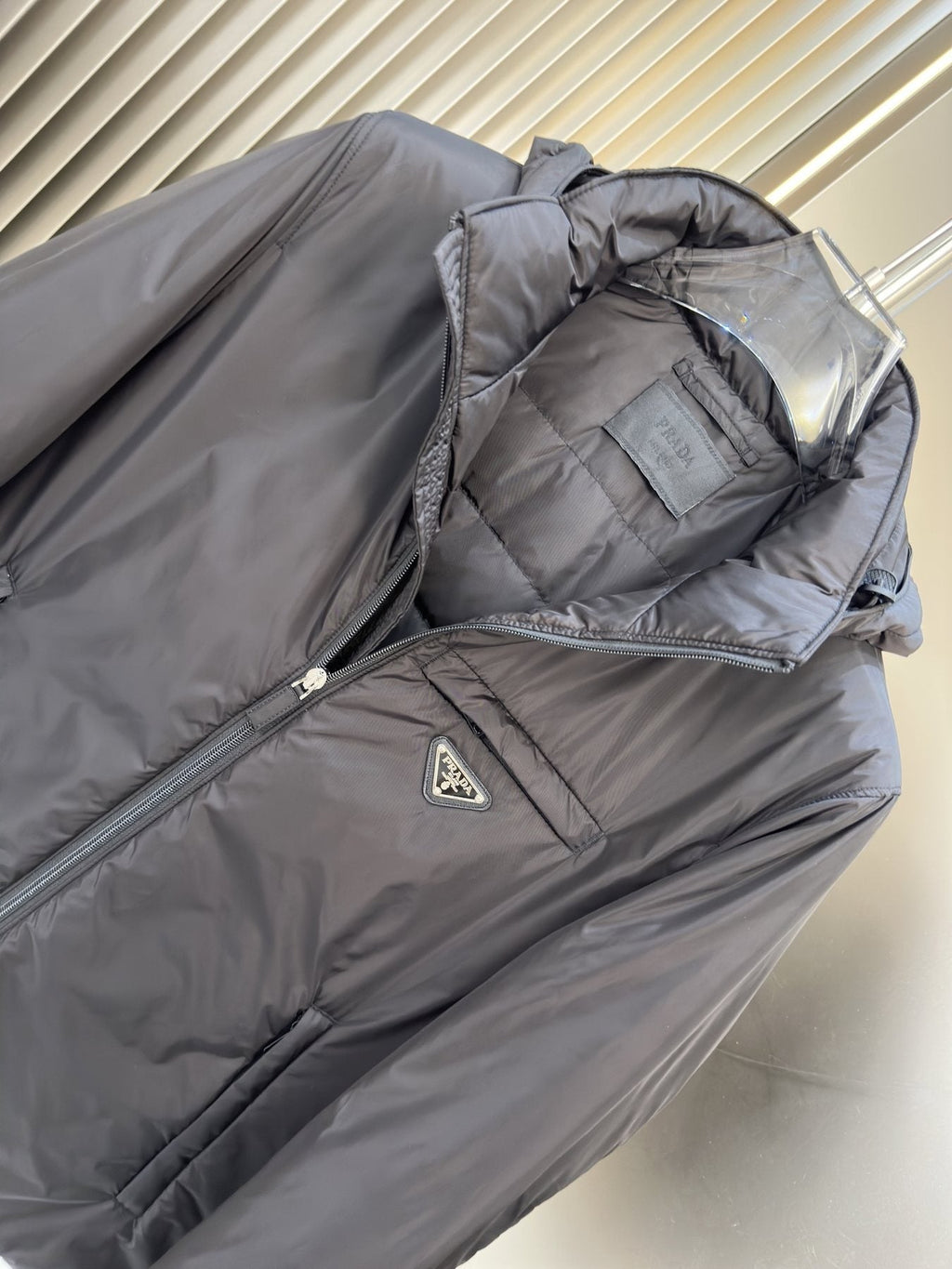 Prada Hooded Puffer Jacket with Triangle Chest Badge — neck_label