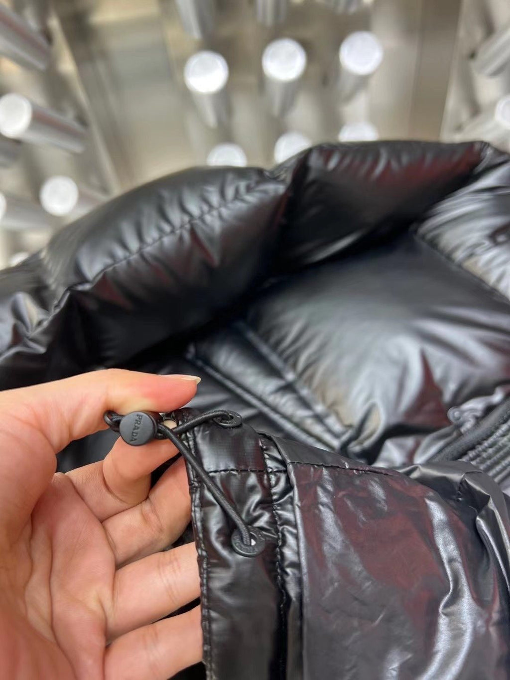 Prada Black Hooded Glossy Quilted Puffer Jacket — fabric_closeup