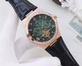 OMEGA Rose Gold Black Green Dial Strap Watch — hero
