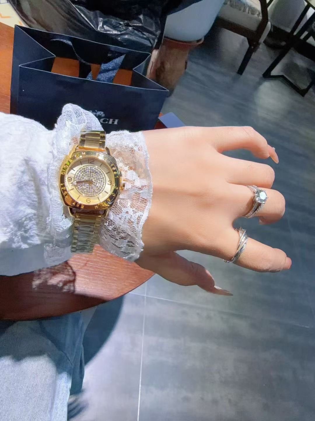 Coach Gold-Tone Crystal Bezel Watch — model